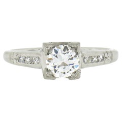 Antique Platinum 0.60ctw Old European Cut Diamond Floral Work Engagement Ring