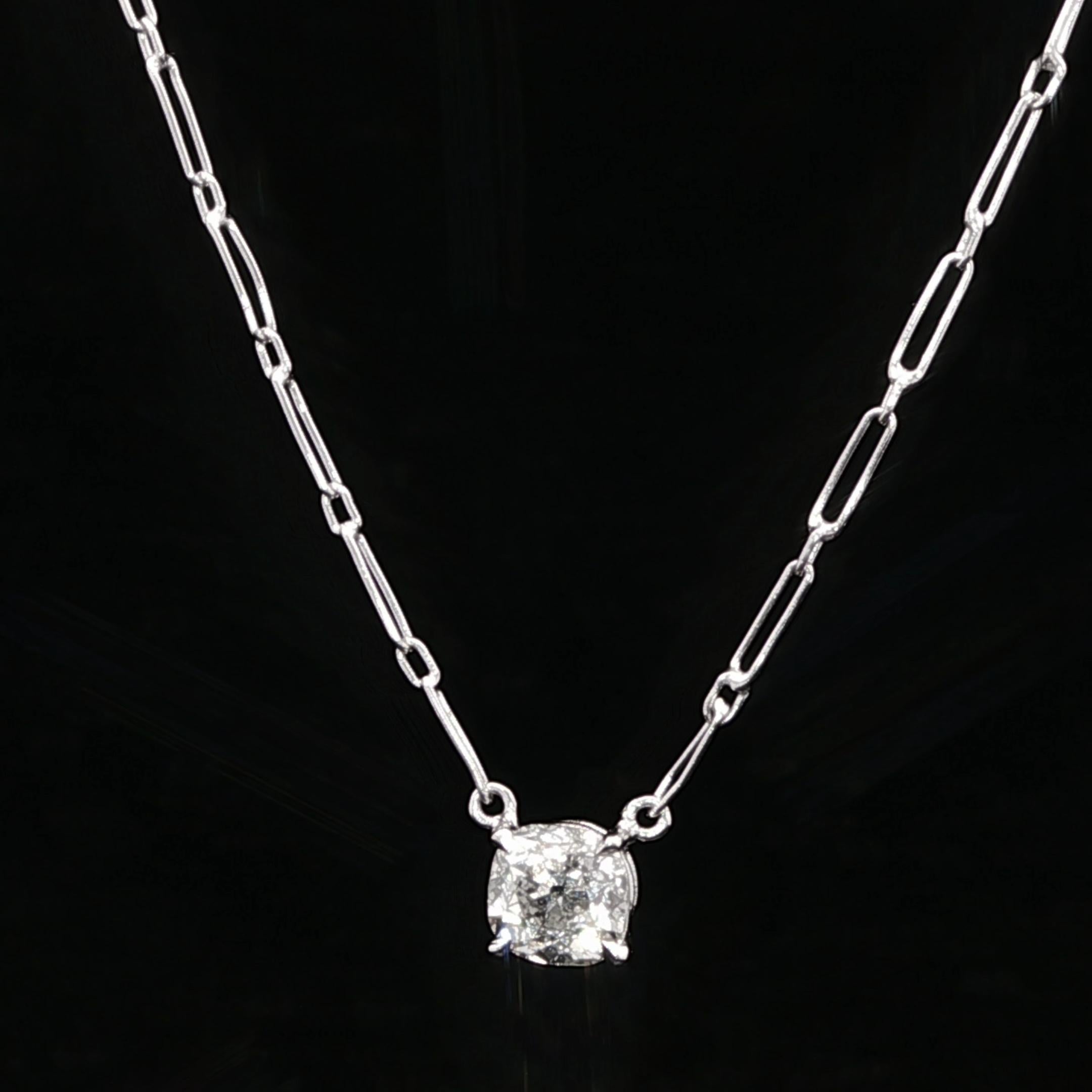--Stone(s):--
(1) Natural Genuine Diamond - Old Mine Cut - Prong Set - H Color - I1 Clarity - 0.71ctw (approx.)

Material: Solid .950 Platinum Pedant - .830 Chain
Weight: 2.8 Grams
Chain Type: 1.32mm - Handmade Paperclip Link - 16.5