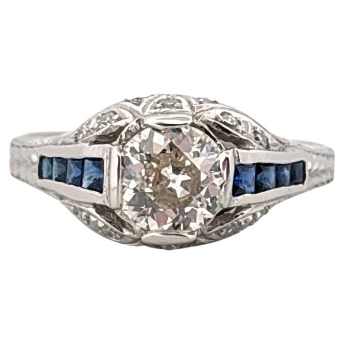 Bague ancienne en platine 0,75 carat centre diamant taille européenne et 0,32 saphir