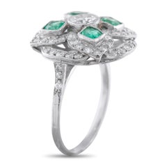 Anello antico in platino con diamanti e smeraldi da 1,30 carati