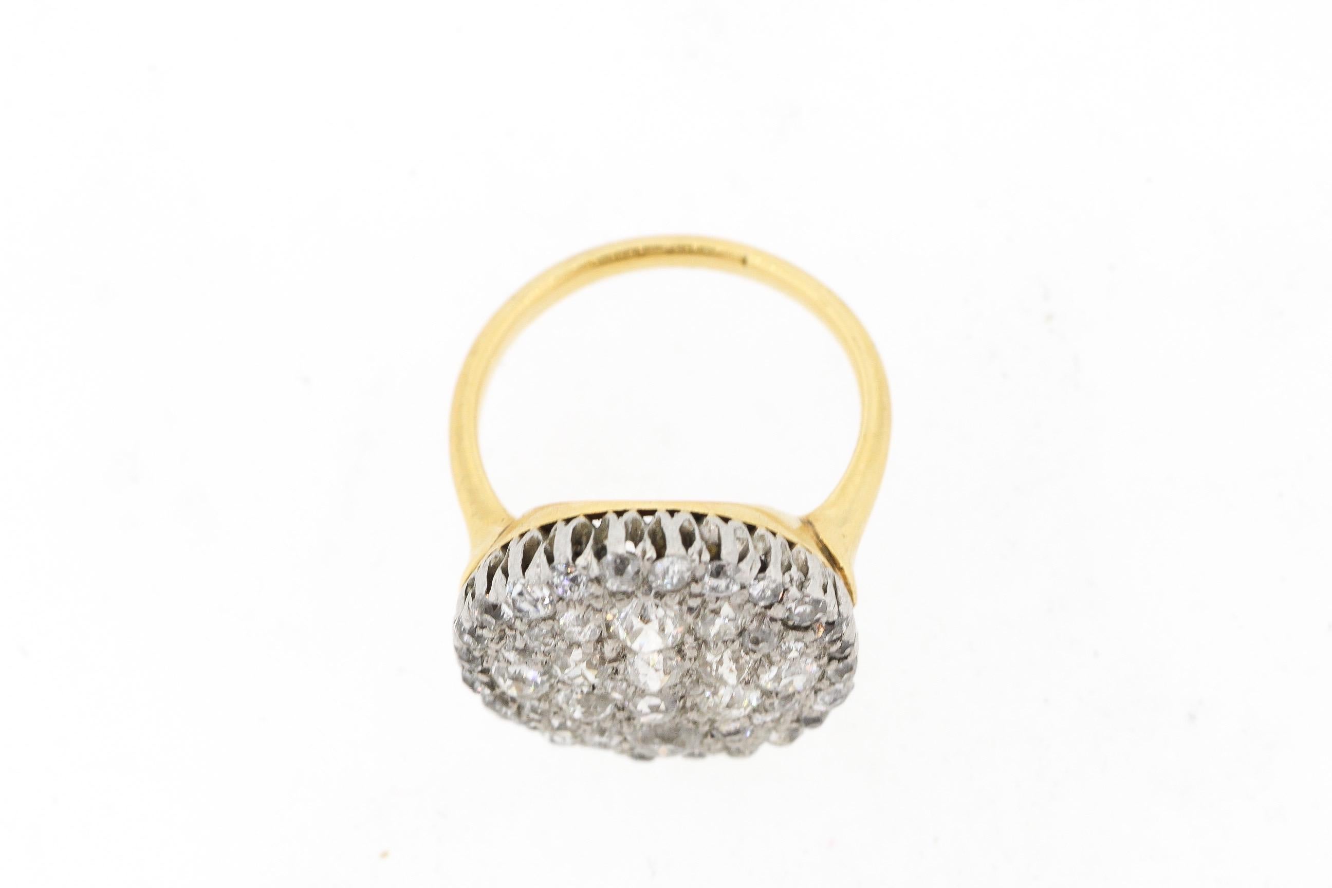 Antique Platinum 18 Karat Gold Diamond Pave Cluster Ring In Good Condition For Sale In New York, NY