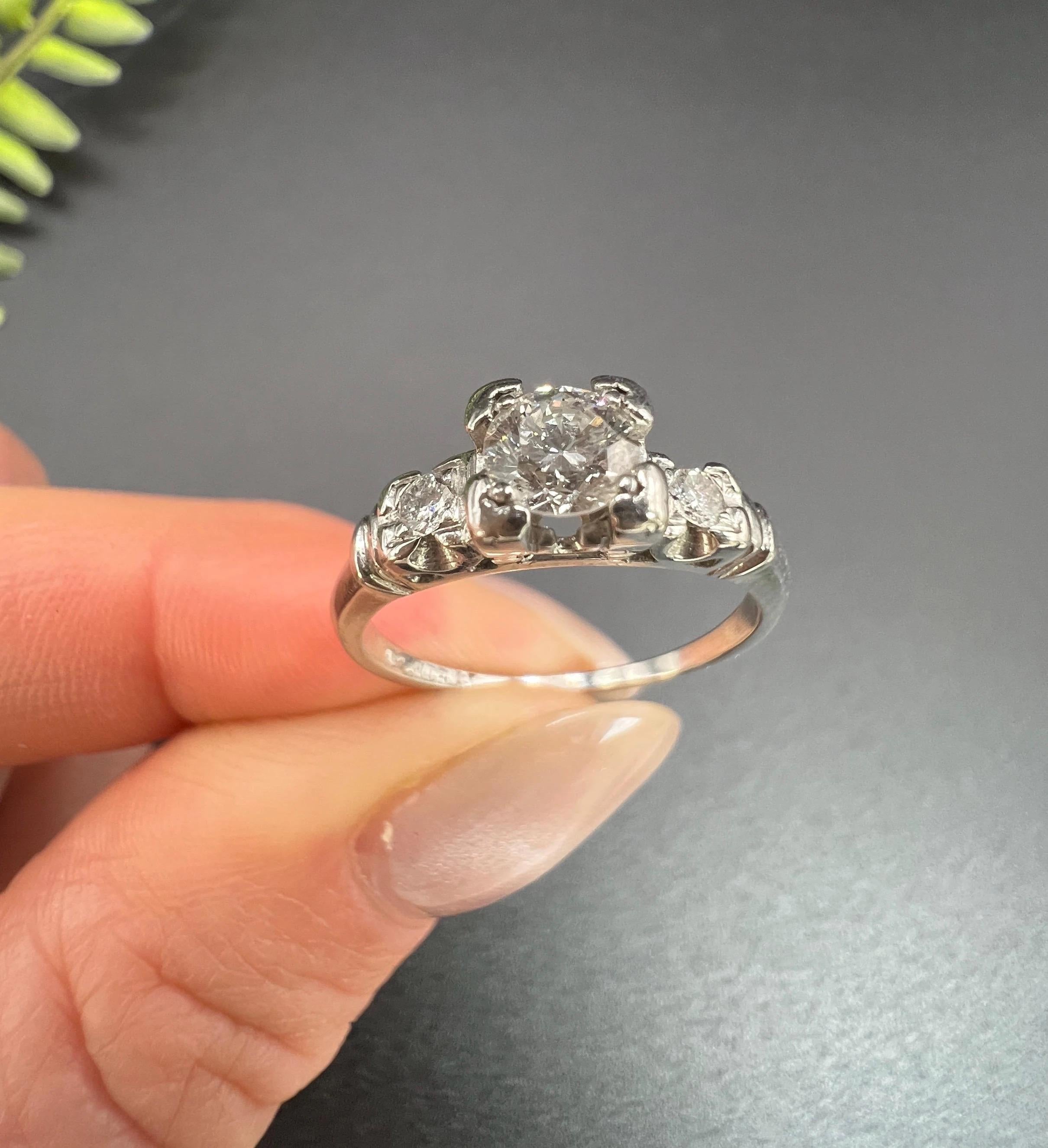 Antique Platinum, 1920s 0.40ct Single Stone Diamond Ring with Diamond Shoulders In Good Condition For Sale In Brighton, GB