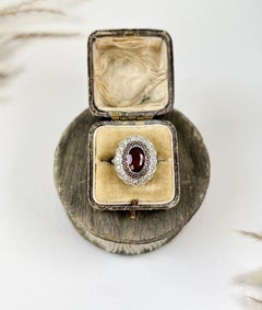 Antique Platinum, 1920s Art Deco Pink Tourmaline Diamond Oval Cluster Halo Ring