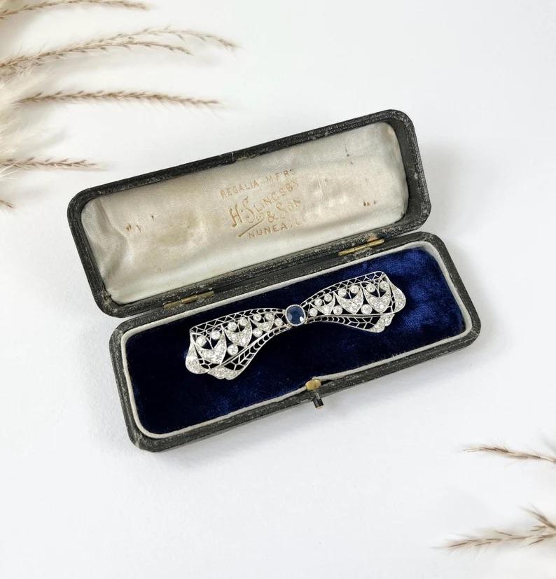 Antique Platinum, 1920s Art Deco Sapphire and Diamond Bow Brooch For Sale 5