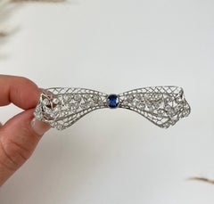 Antique Platinum, 1920s Art Deco Sapphire and Diamond Bow Brooch