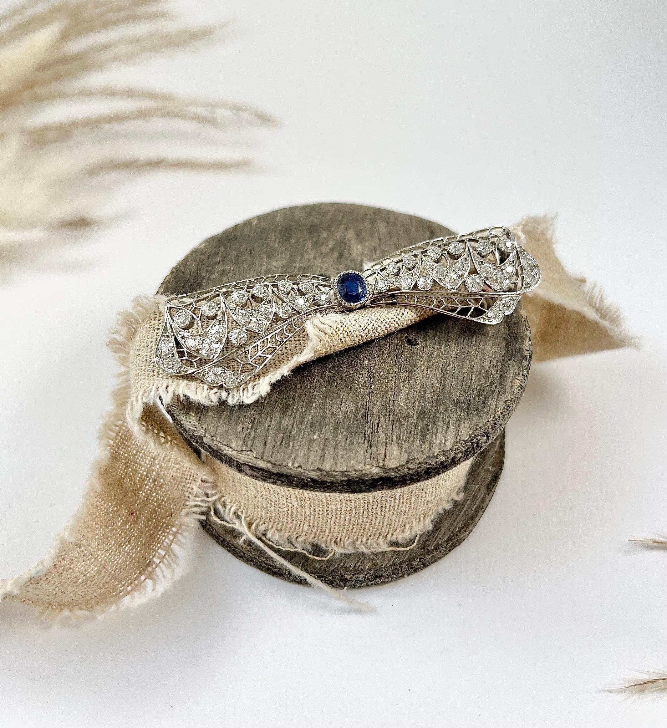 Antique Platinum, 1920s Art Deco Sapphire and Diamond Bow Brooch For Sale 4