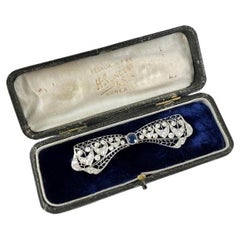 Antique Platinum, 1920s Art Deco Sapphire and Diamond Bow Brooch