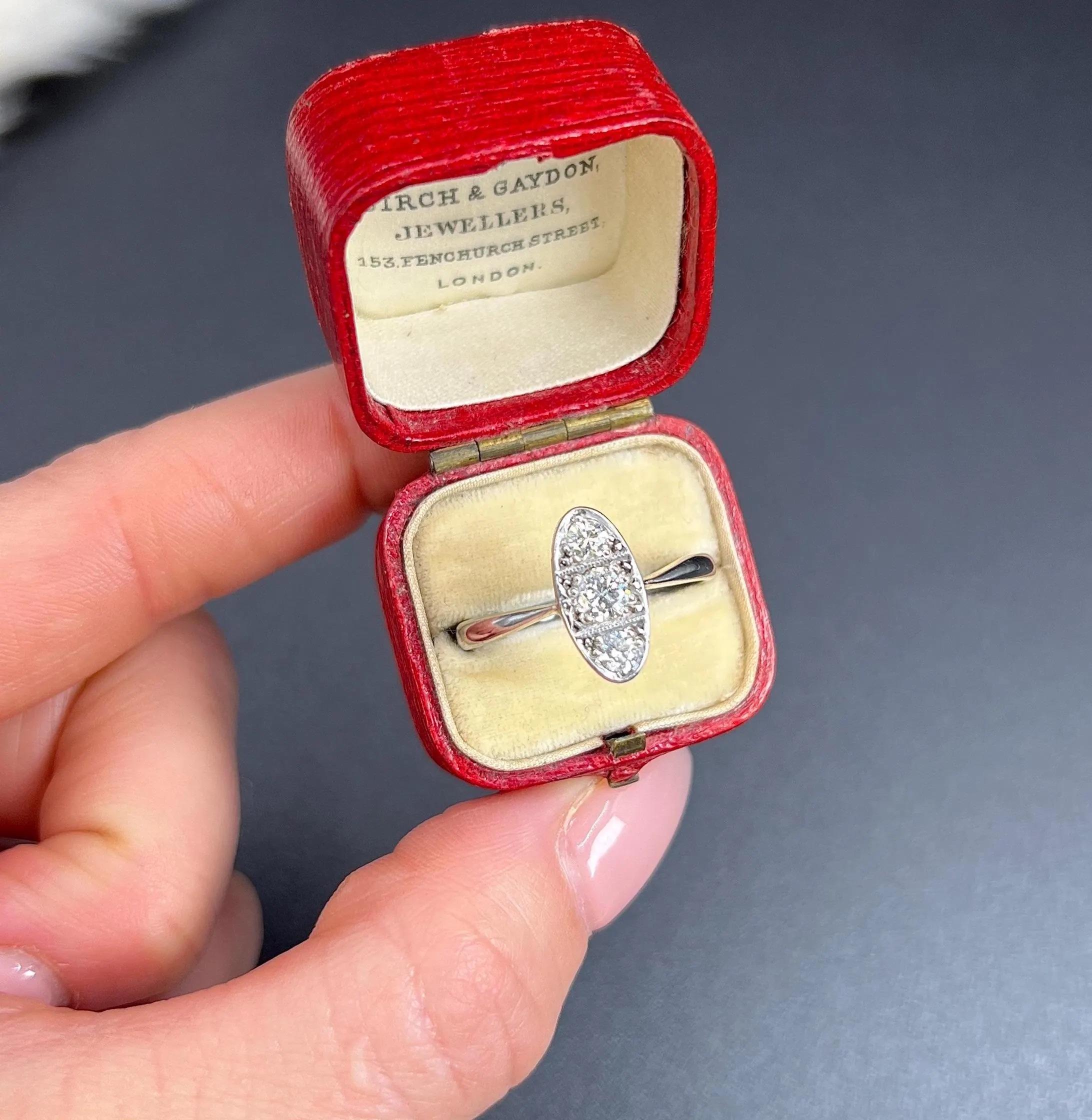 Women's or Men's Antique Platinum, 1920s Art Deco Three Stone Oval Shaped Diamond Ring For Sale