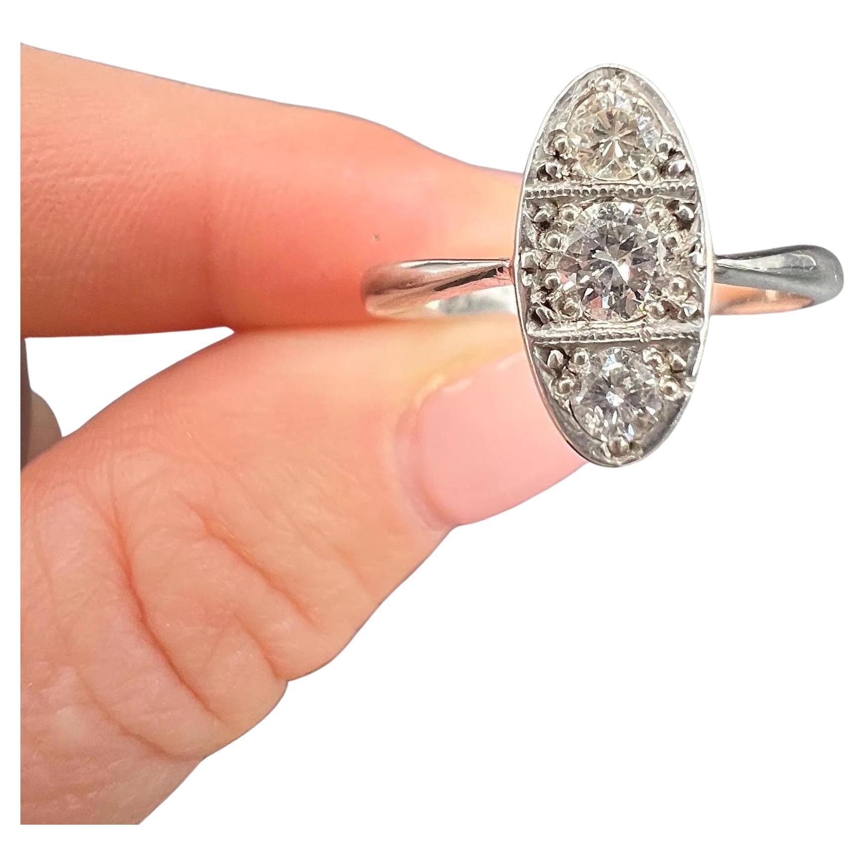 Antique Platinum, 1920s Art Deco Three Stone Oval Shaped Diamond Ring
