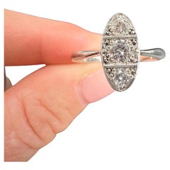 Antique Platinum, 1920s Art Deco Three Stone Oval Shaped Diamond Ring