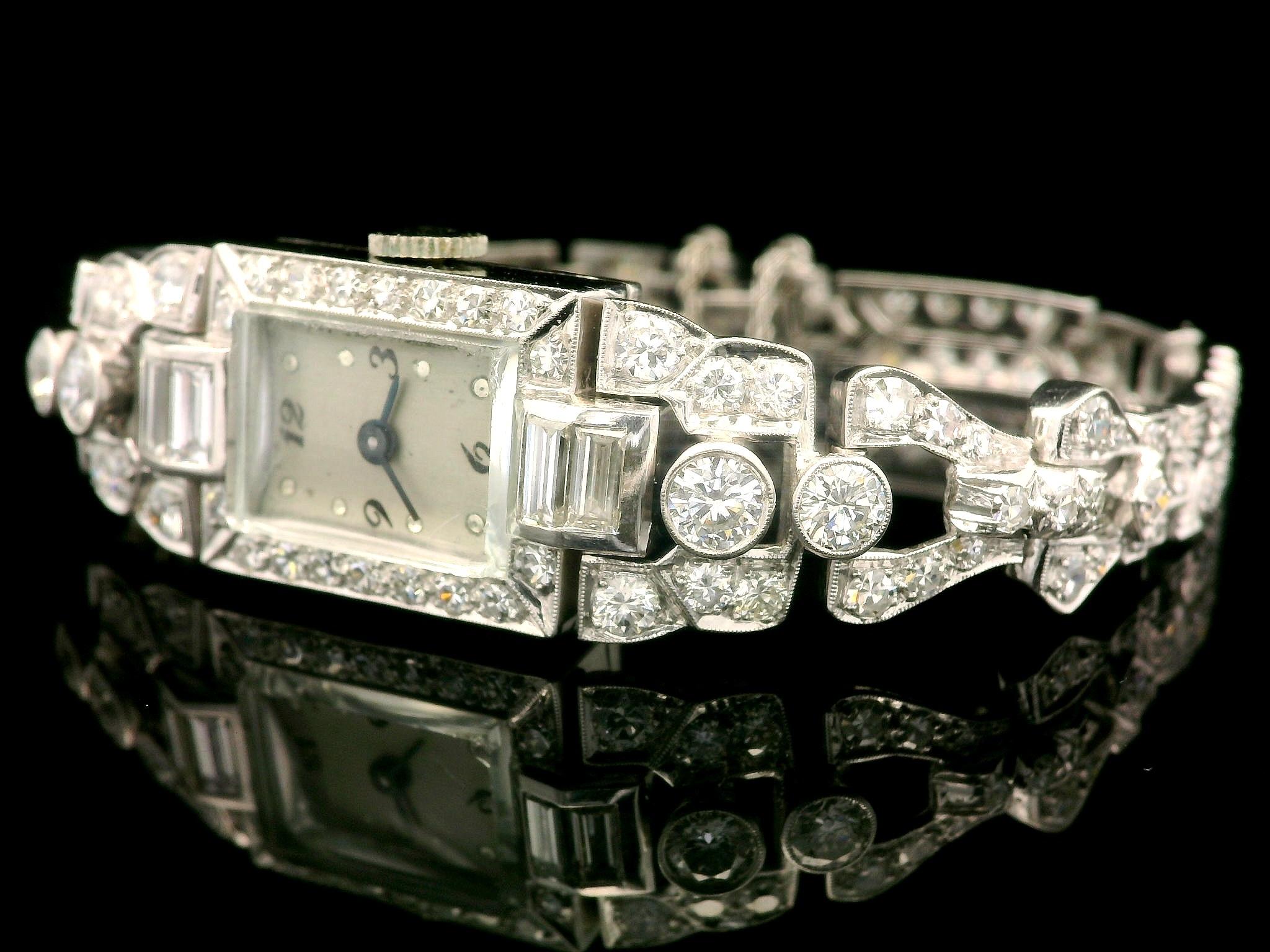 Antique Platinum 3.72ctw Old Round & Baguette Cut Diamond Fancy Wrist Watch Brac In Good Condition For Sale In Montclair, NJ