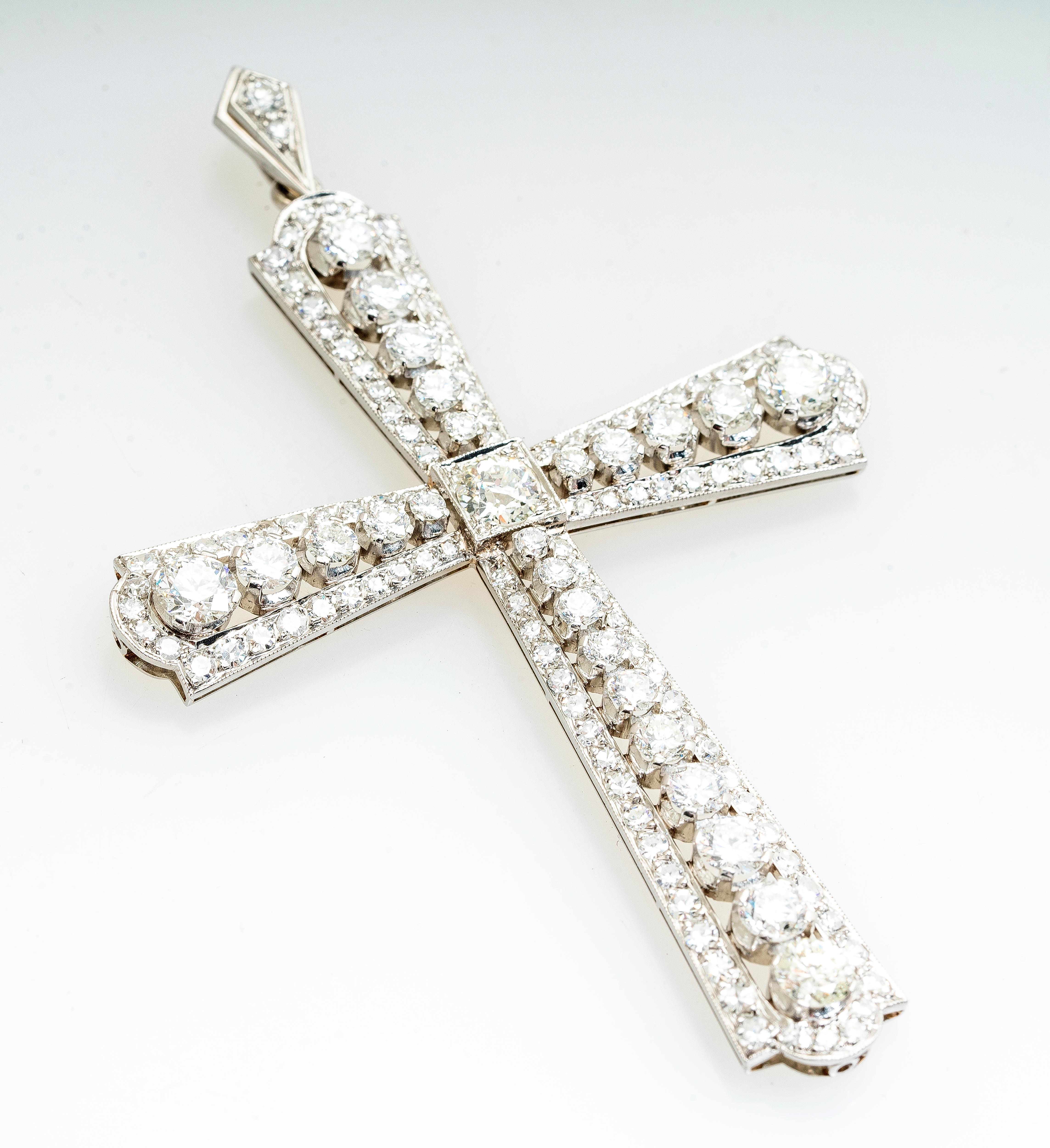 Antique platinum diamond large cross pendant.  Cross features an array of old European cut, transition cut and single cut diamonds weighing approximately 6.00 carat total weight.  Diamonds are J-K color and SI1-SI2 clarity.  Milgrain detailing all