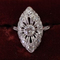 Antique Platinum and 14k Gold Filigree Diamond Ring