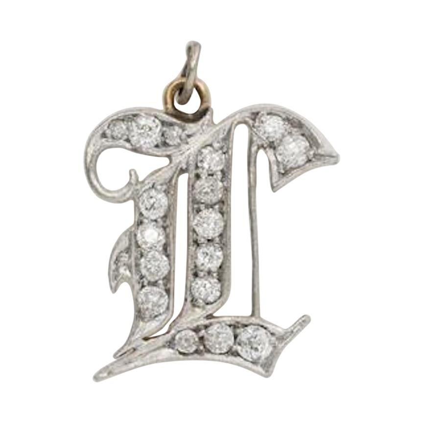 Antique Platinum and 18 Karat Yellow Gold and Diamond Monogram Charm