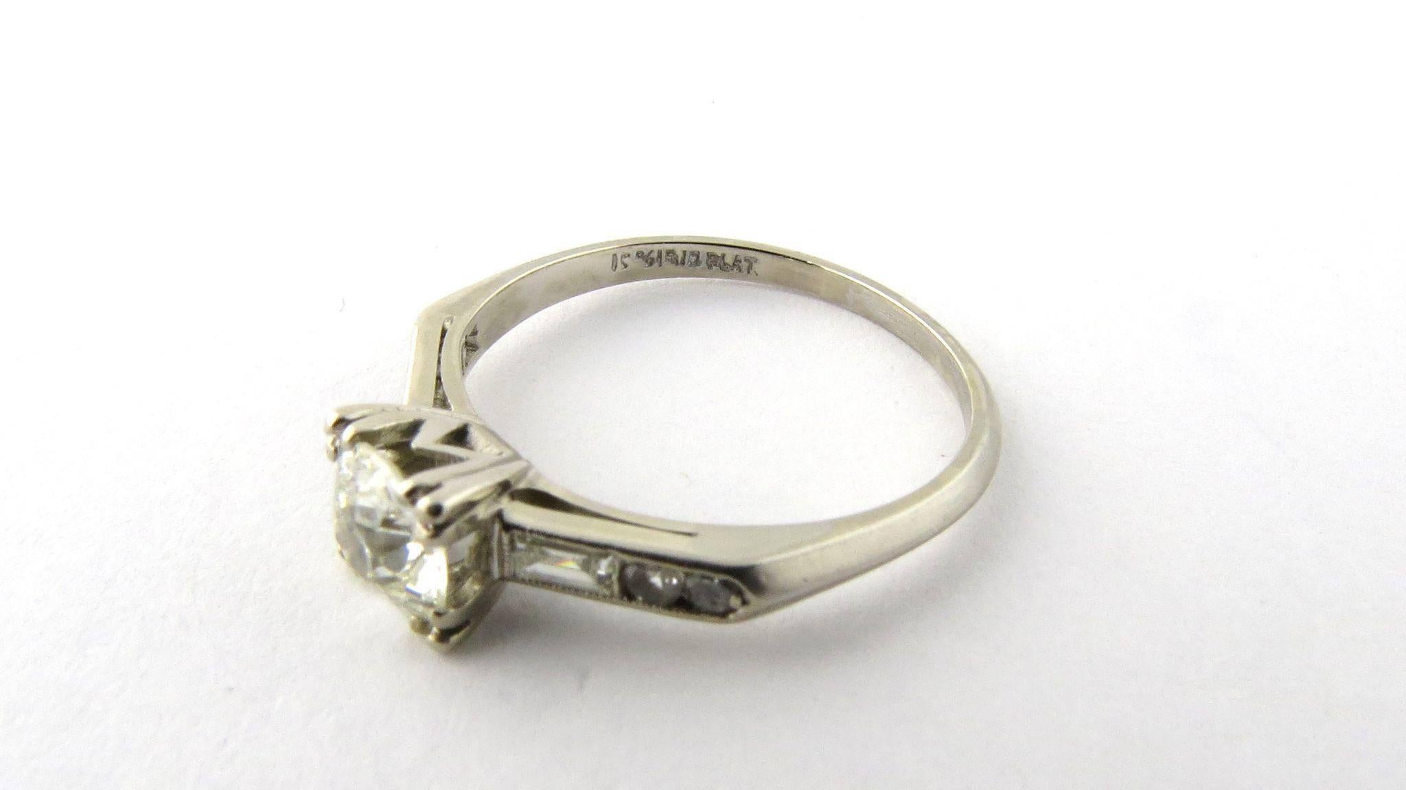 Antique Platinum and Old Miner Diamond Engagement Ring Size 6 

Center diamond is a round old miner. Approximately .7 carats SI1 clarity with some chips to the girdle which is rough - small chip on crown as well K color 

to each side is on baguette