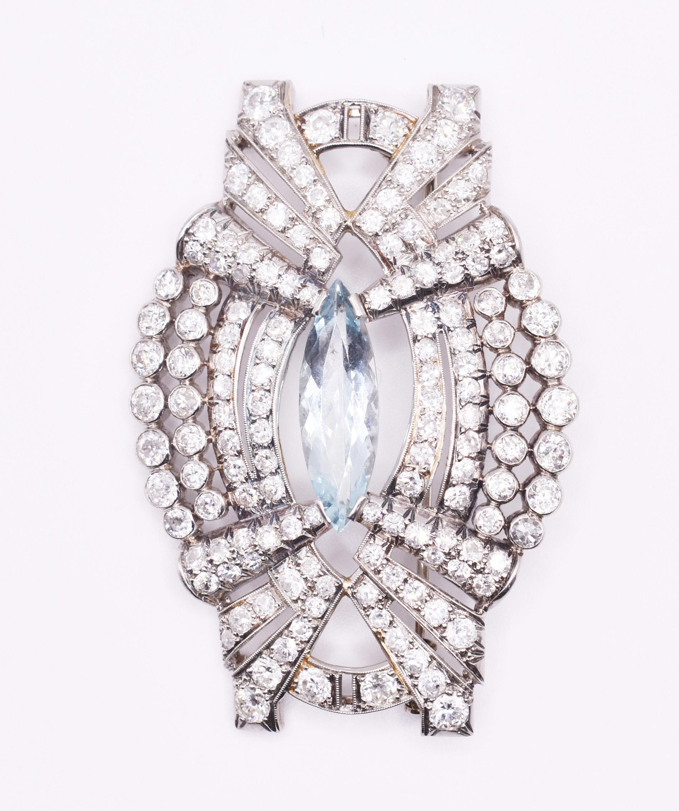 A stunning antique platinum, aquamarine and diamond brooch featuring 140 stunning old cut diamonds totalling an approximate 7cts, with a fantastic aquamarine centre, approximately 3.50ct. The brooch remains in excellent condition for its