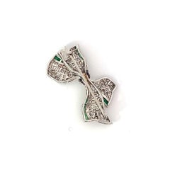 Antique Platinum Bow Brooch with Diamonds and Emeralds