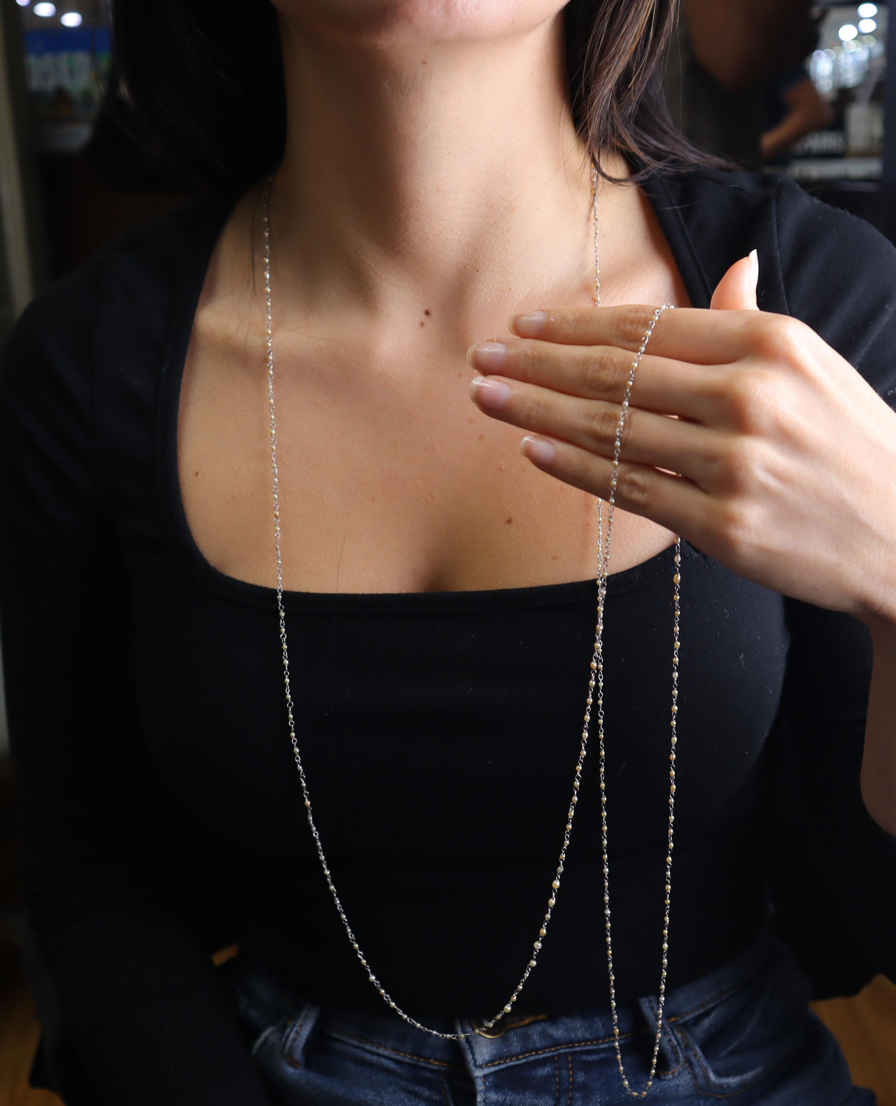 Discover the enchanting beauty of our Elegant Platinum Chain, beautifully enhanced with Natural Micro Pearls ranging from 1.5 to 2.0 mm in diameter. This exquisite piece of jewelry seamlessly blends modern elegance with classic charm. Crafted