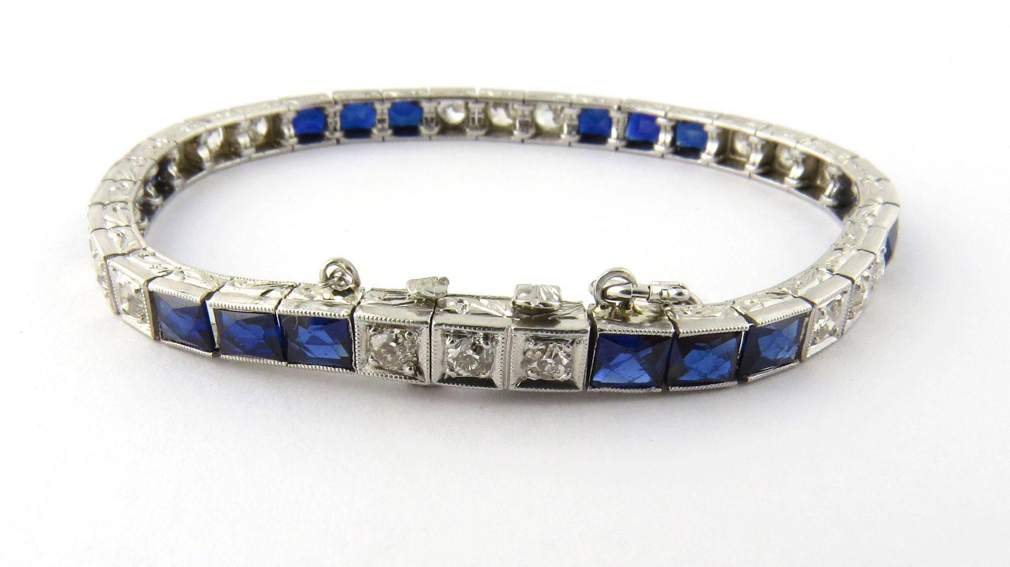 Antique Platinum Diamond and Sapphire Bracelet. 

Old miner cut diamonds and rectangle cut sapphires make up this gorgeous antique bracelet with safety chain. 

Underside latch, push button clasp and safety chain will keep this bracelet secure.