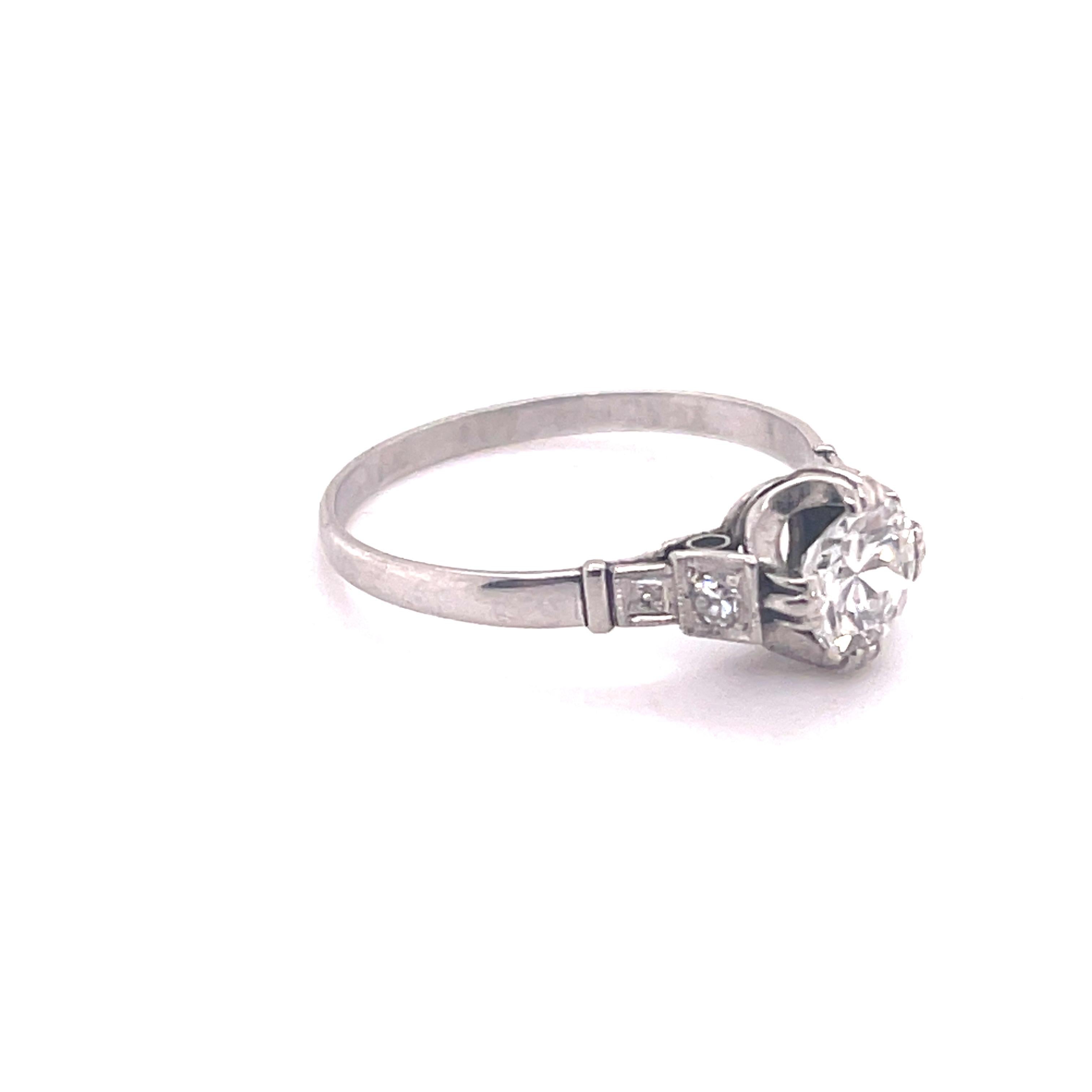 Gender: Ladies
Size: 6.5 US
Total Weight: 2.4 grams
Purity: Platinum
Shank type: Half Round
Condition: Pre-owned in excellent condition. Quality and Durability was checked by professional jewelers.

Double-Prong Set in Platinum with:
One (1) early