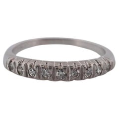 Fascia a canale per l'eternità in platino antico con diamanti. Diamante Art Deco eternità