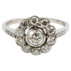 Vintage Platinum Diamond Flower Cluster Ring. est.75ct, j/ si1 clarity.  US 6.75
