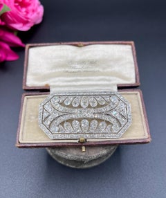 Antique Platinum, Edwardian era 10 Carat Diamond Openwork Brooch