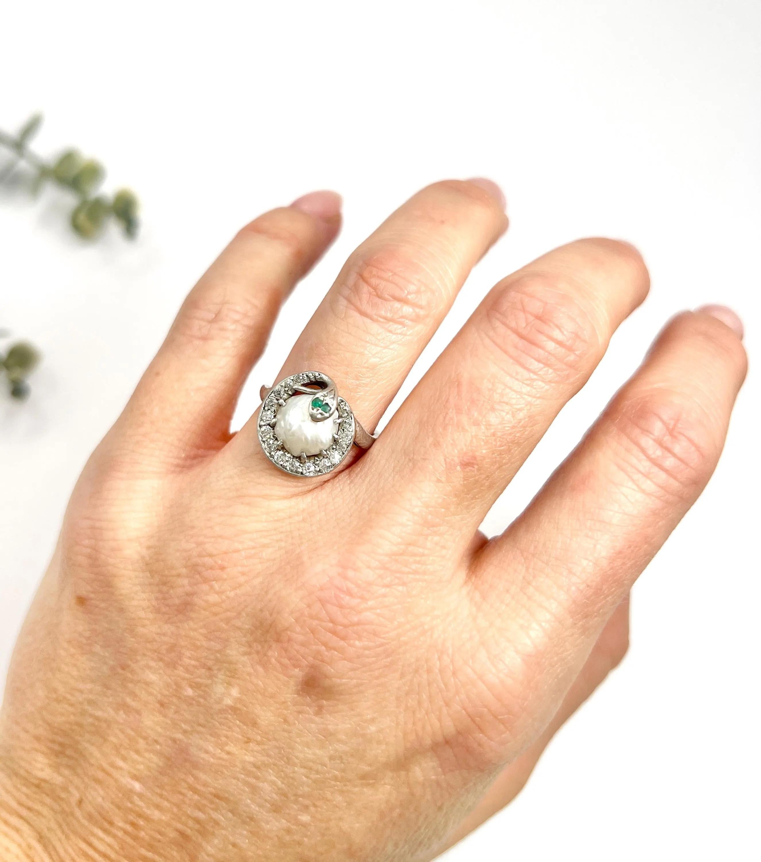 Antique Snake Ring 

Platinum Tested

Circa 1910

Step back in time with this exquisite Edwardian-era platinum snake ring, a true testament to the artistry of the early 20th century. This captivating piece features a magnificent diamond-set snake,