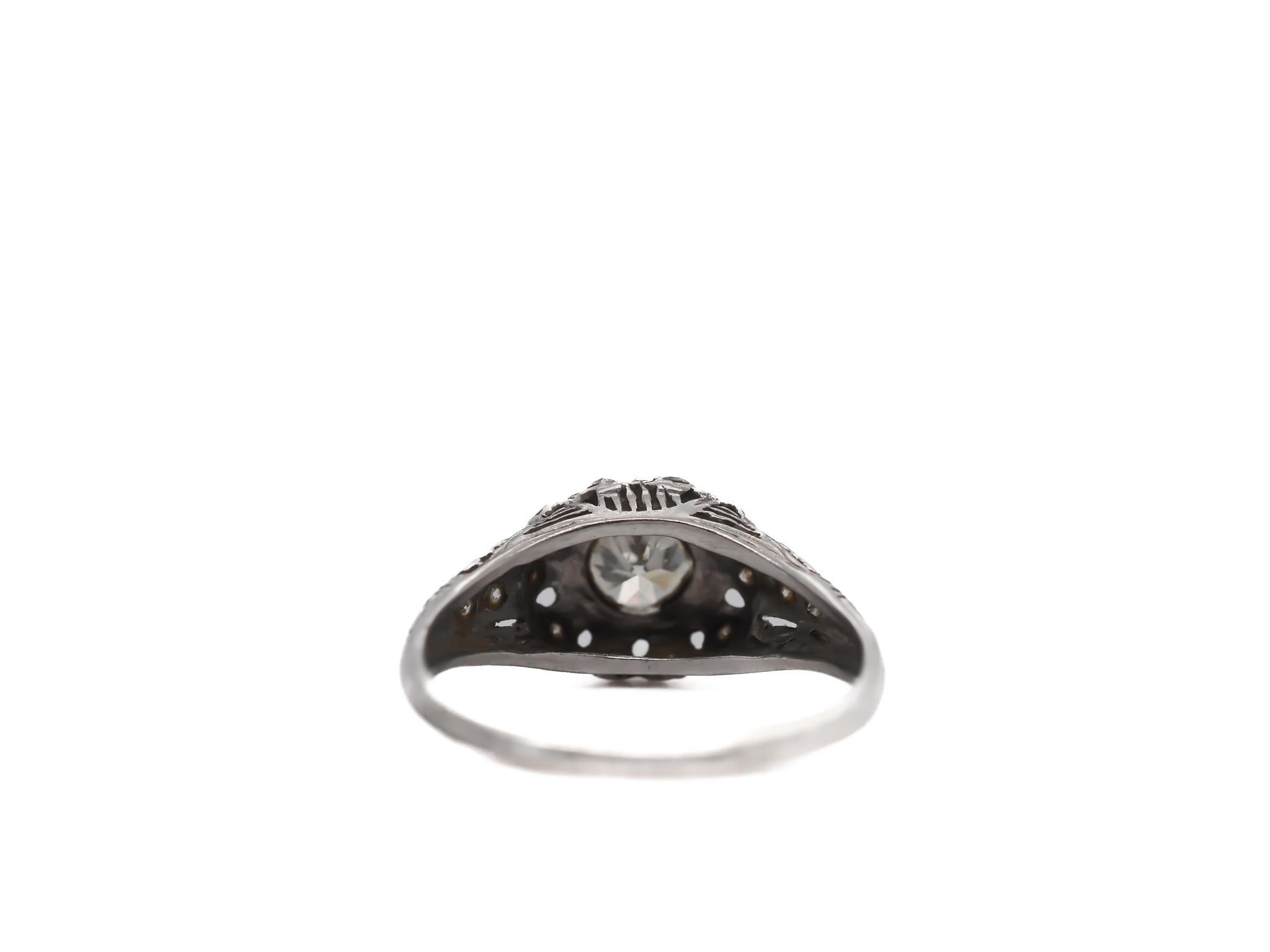 Item Details: 
Ring Size: 7.5
Metal Type: Platinum
Weight: 3.8 grams

Center Diamond Details
Carat Weight: .65ct
Measurements : 5.5mm 
Color: J
Clarity: VS1

Finger To Top Of Stone Measurement: 6.19mm