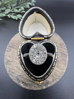 Antique Platinum French Stamped, Edwardian era Oval Diamond Cluster Ring