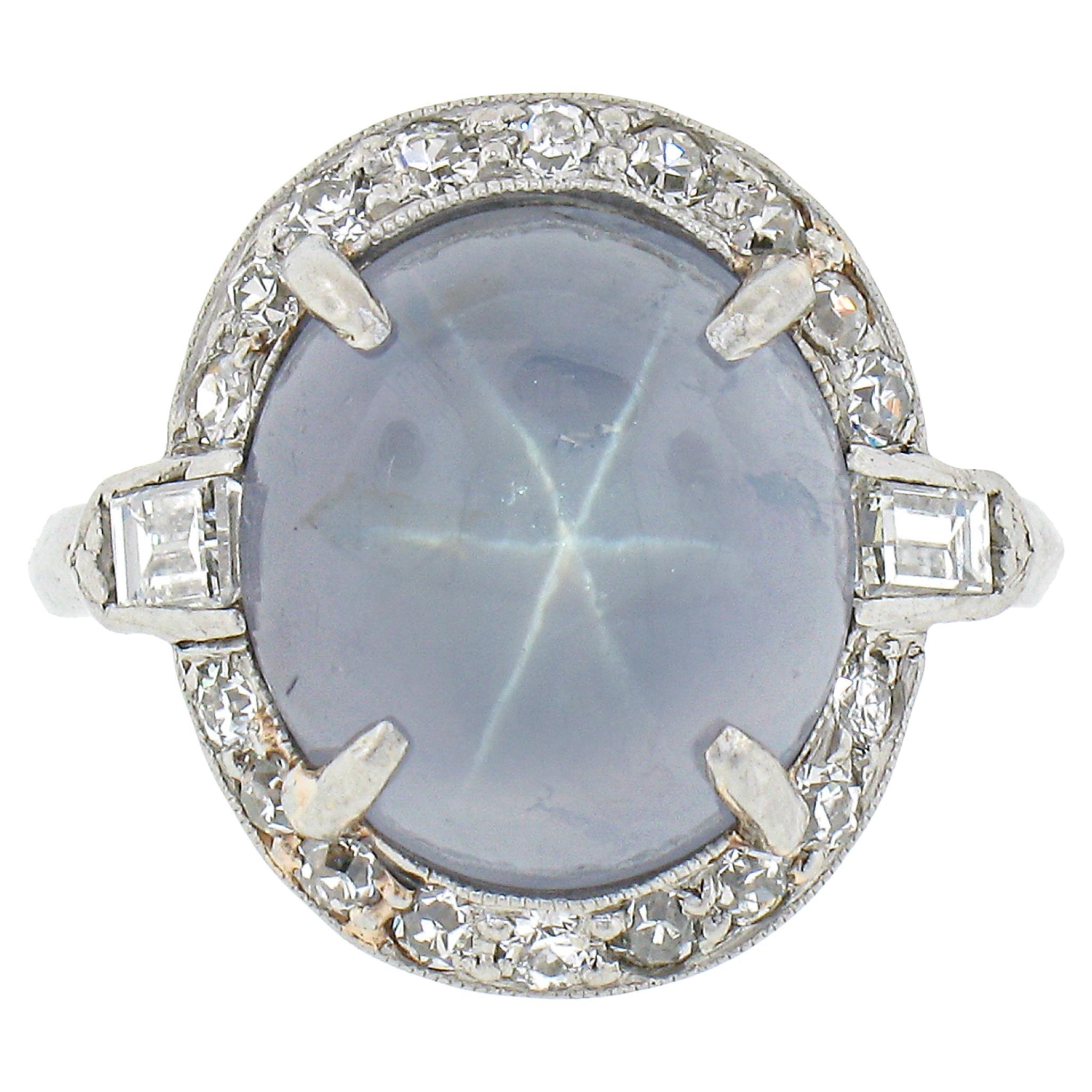 Bague ancienne en platine avec saphir bleu étoilé cabochon de Ceylan certifié GIA et diamants en vente