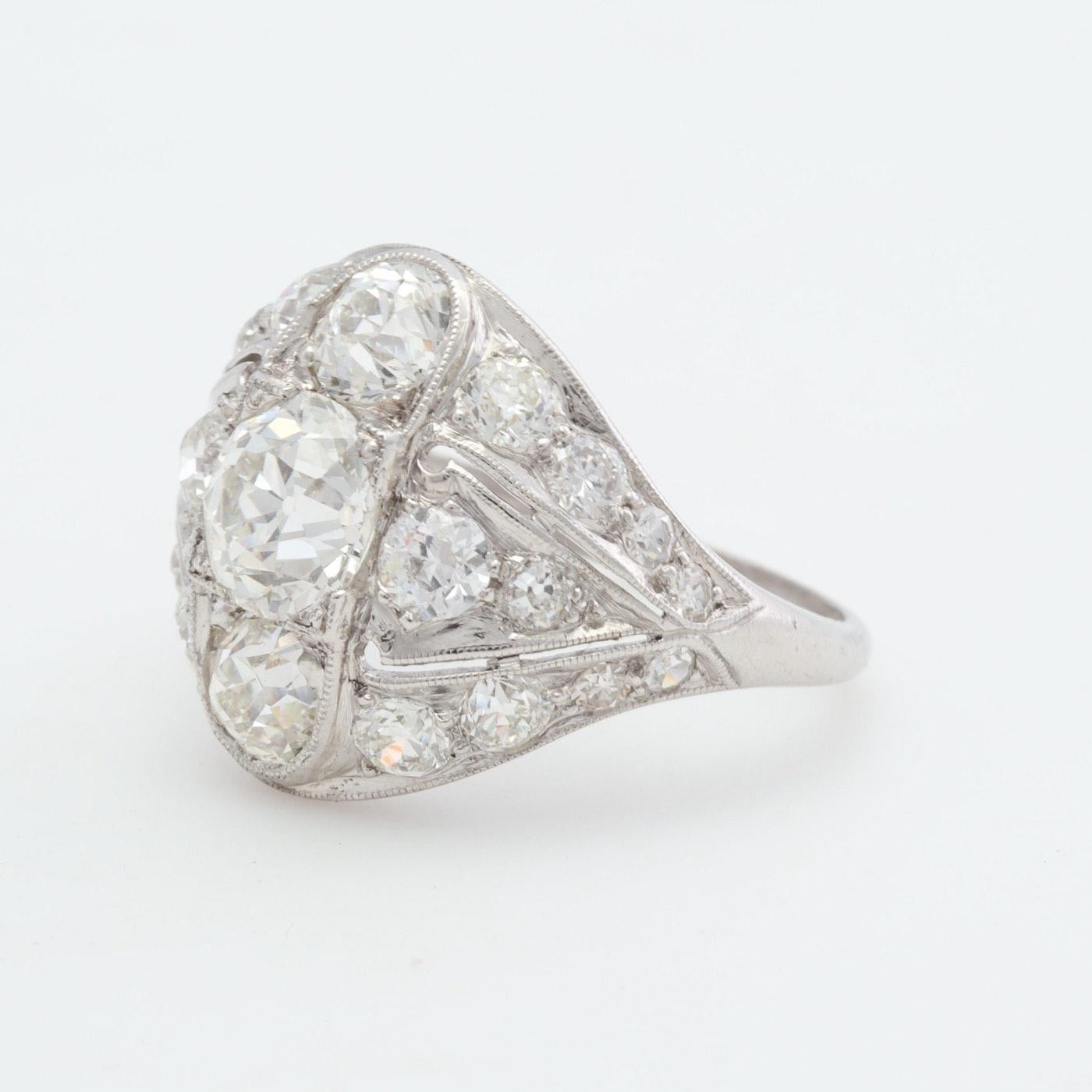 This beautiful example of fine Art Deco jewelry with turn heads everywhere she goes! With over 3.5 carats of top quality old cut diamonds this scintillating ring, it is stunning from all angles! Top quality genuine GIA Old European Cut diamonds,