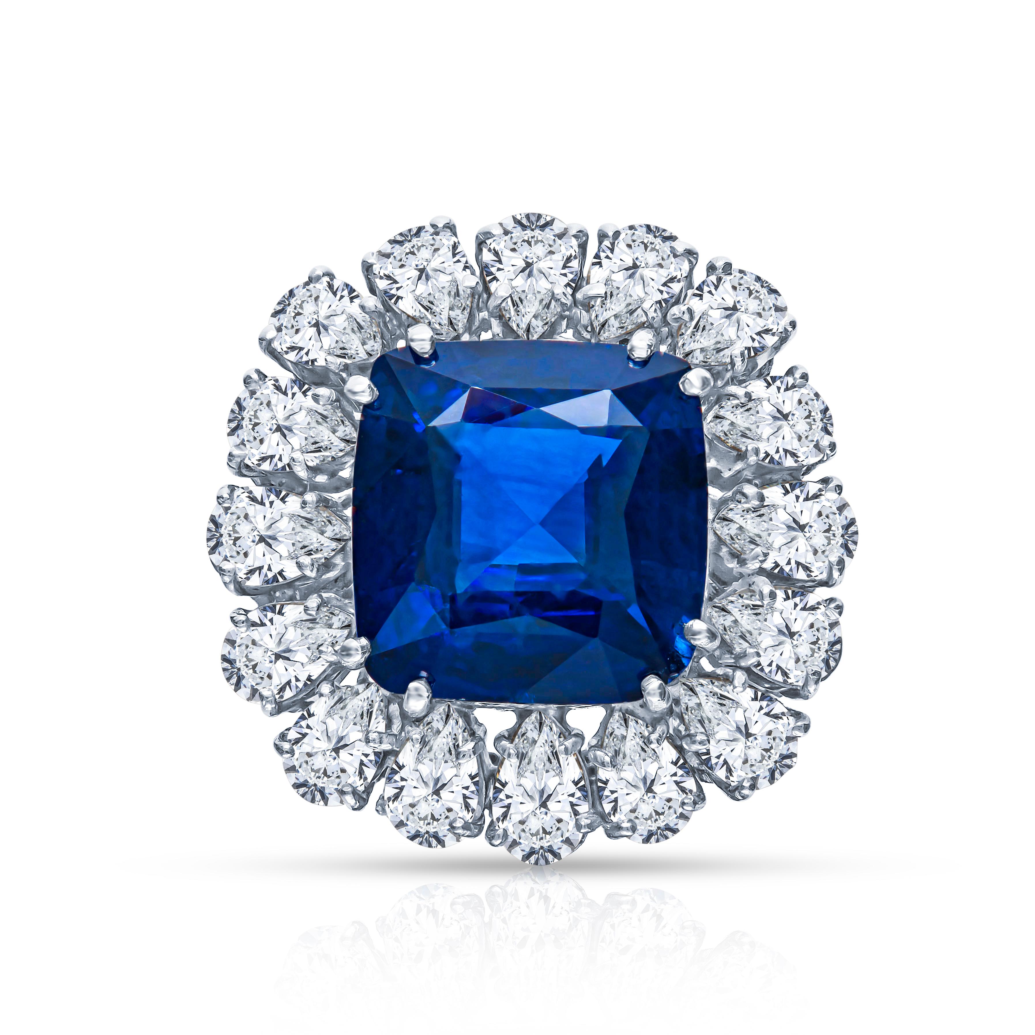 This is an absolutely gorgeous Estate Antique Platinum GRS Certifies 14.13 CTW Cushion Cut Sapphire And Diamond Engagement Ring. The center stone is a Sri Lanka Sapphire vivid royal blue color. It weighs 9.33 carats and is mounted in a gorgeous Art