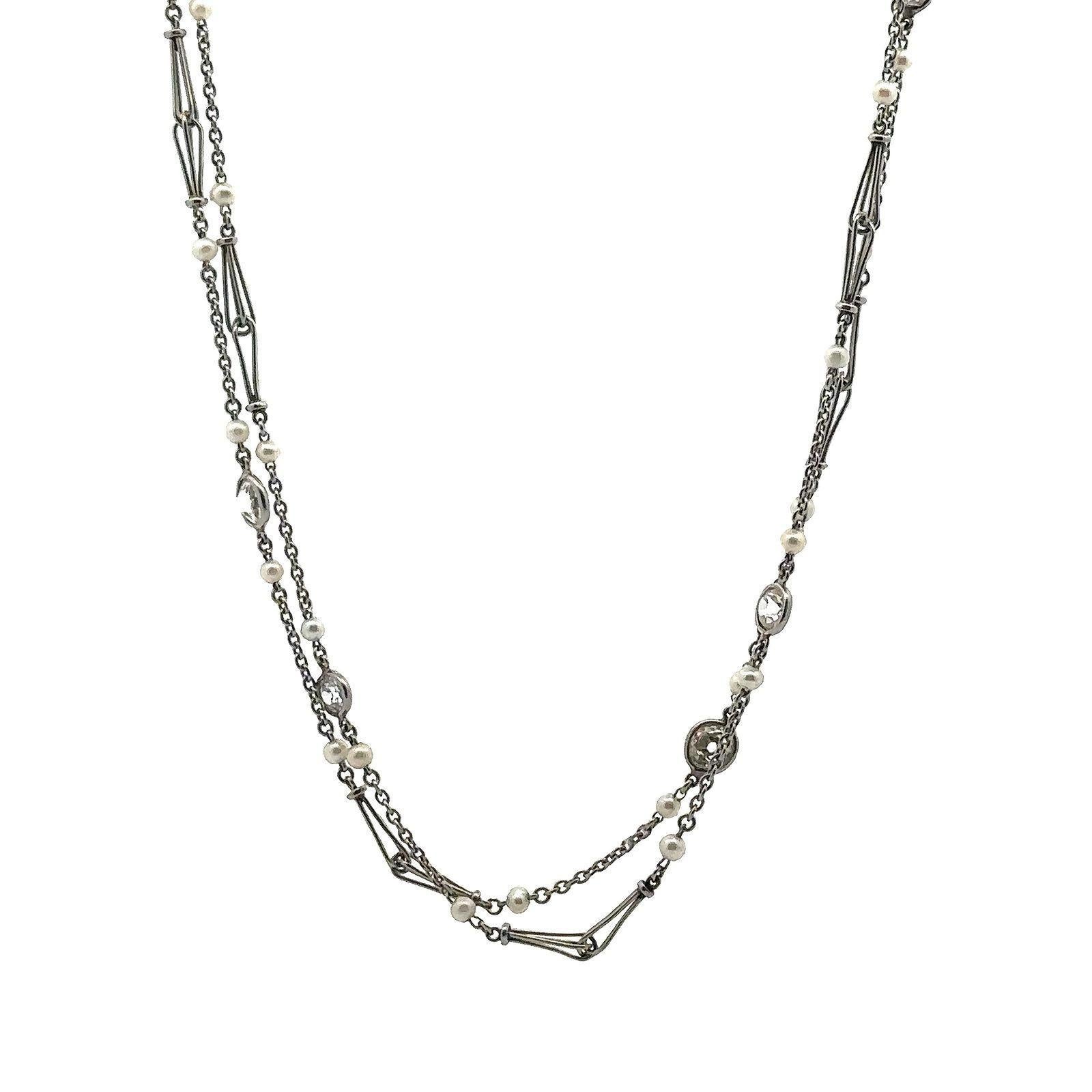 Antique Platinum Long chain with 1.75 Cts Diamonds & Pearls In Good Condition For Sale In Aventura, FL