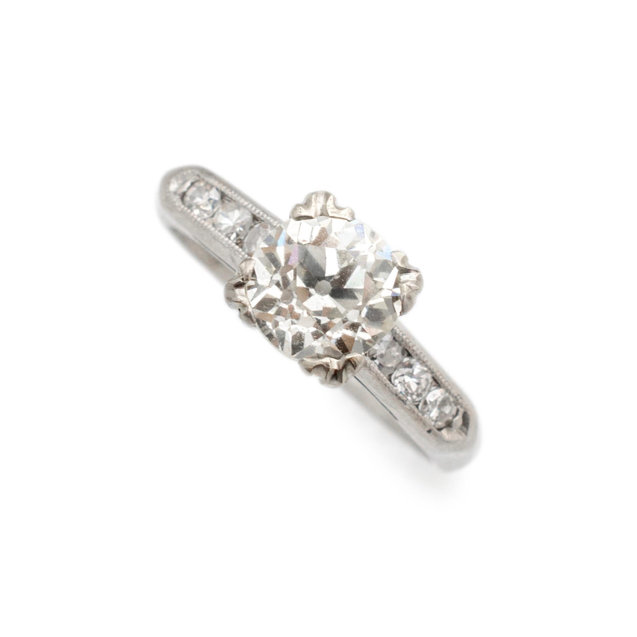 Gender: Ladies

Metal Type: Platinum

Ring Size: 5.5

Shank Maximum Width: 2.80 mm

Weight: 3.86 grams

Ladies handmade platinum diamond antique engagement accented ring with a half-round shank. The metal was tested and determined to be platinum.