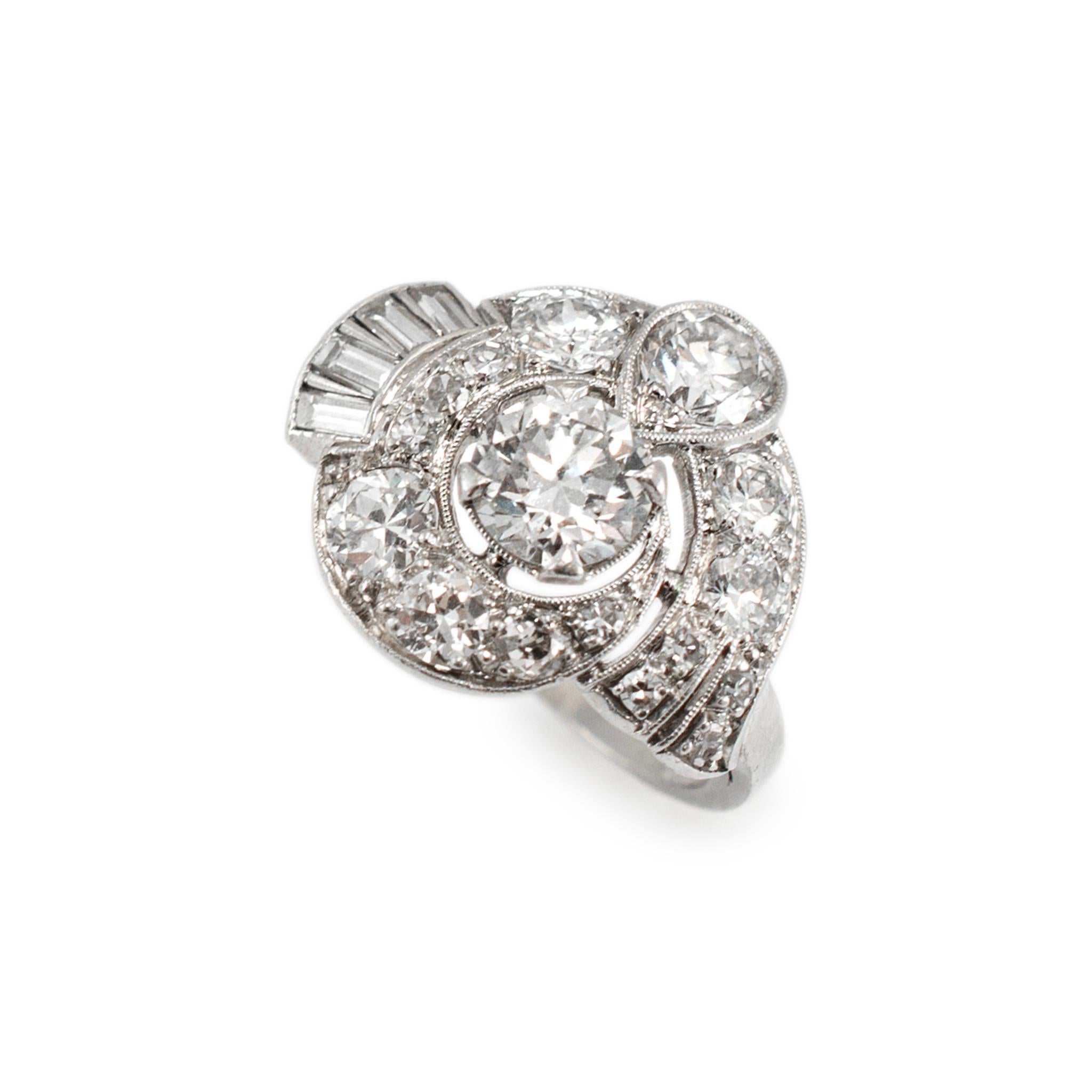 Gender: Ladies

Metal Type: Platinum

Ring Size: 4.25

Weight: 5.84 grams

One ladies handmade designer made filigreed platinum diamond antique cocktail ring with a half-round shank. The metal was tested and determined to be platinum. Engraved with