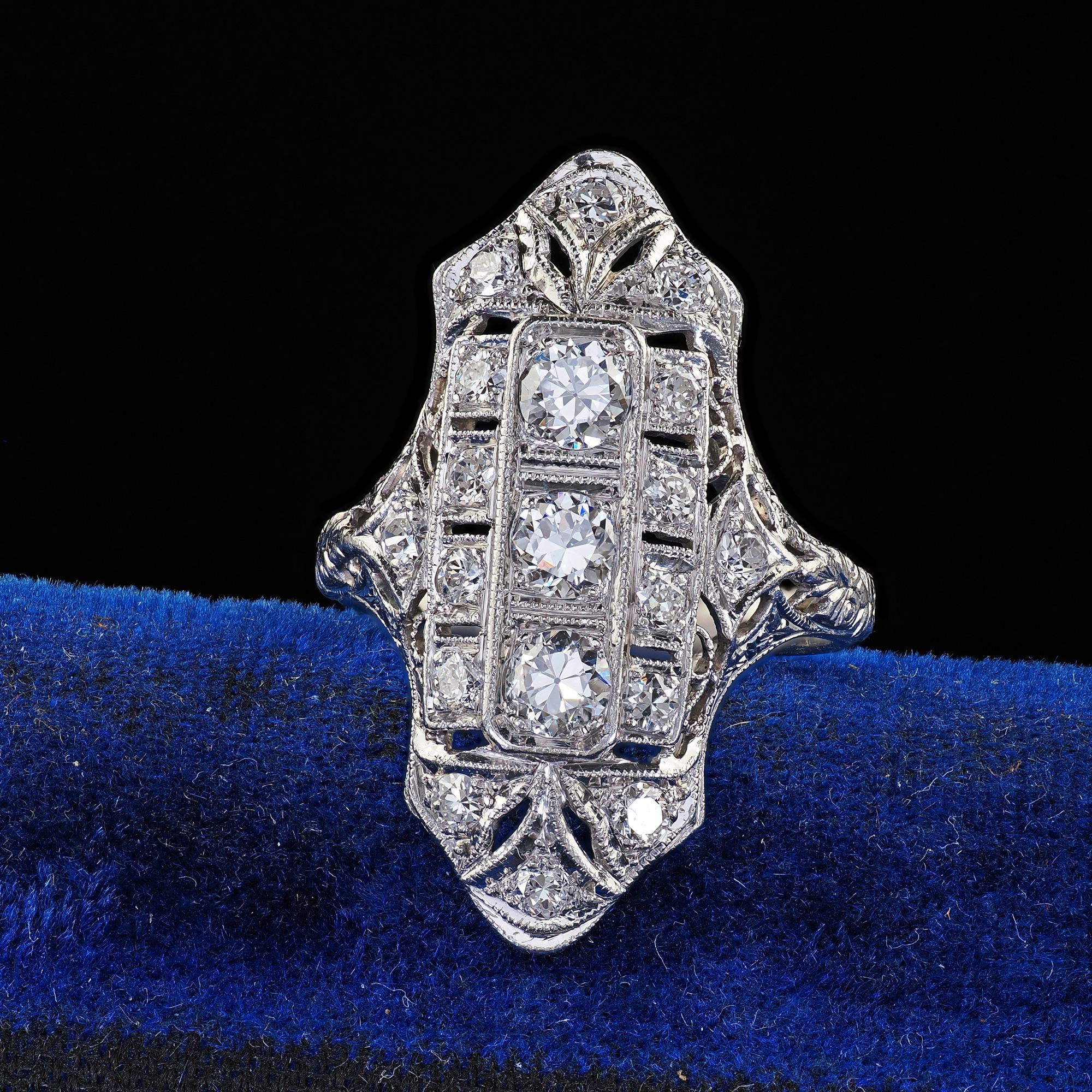 Beautiful Antique Platinum Old European Cut Diamond Filigree Cocktail Shield Ring. This gorgeous Art Deco old European cut diamond shield ring is crafted in platinum. The ring features gorgeous old cut diamonds set throughout the ring in a gorgeous