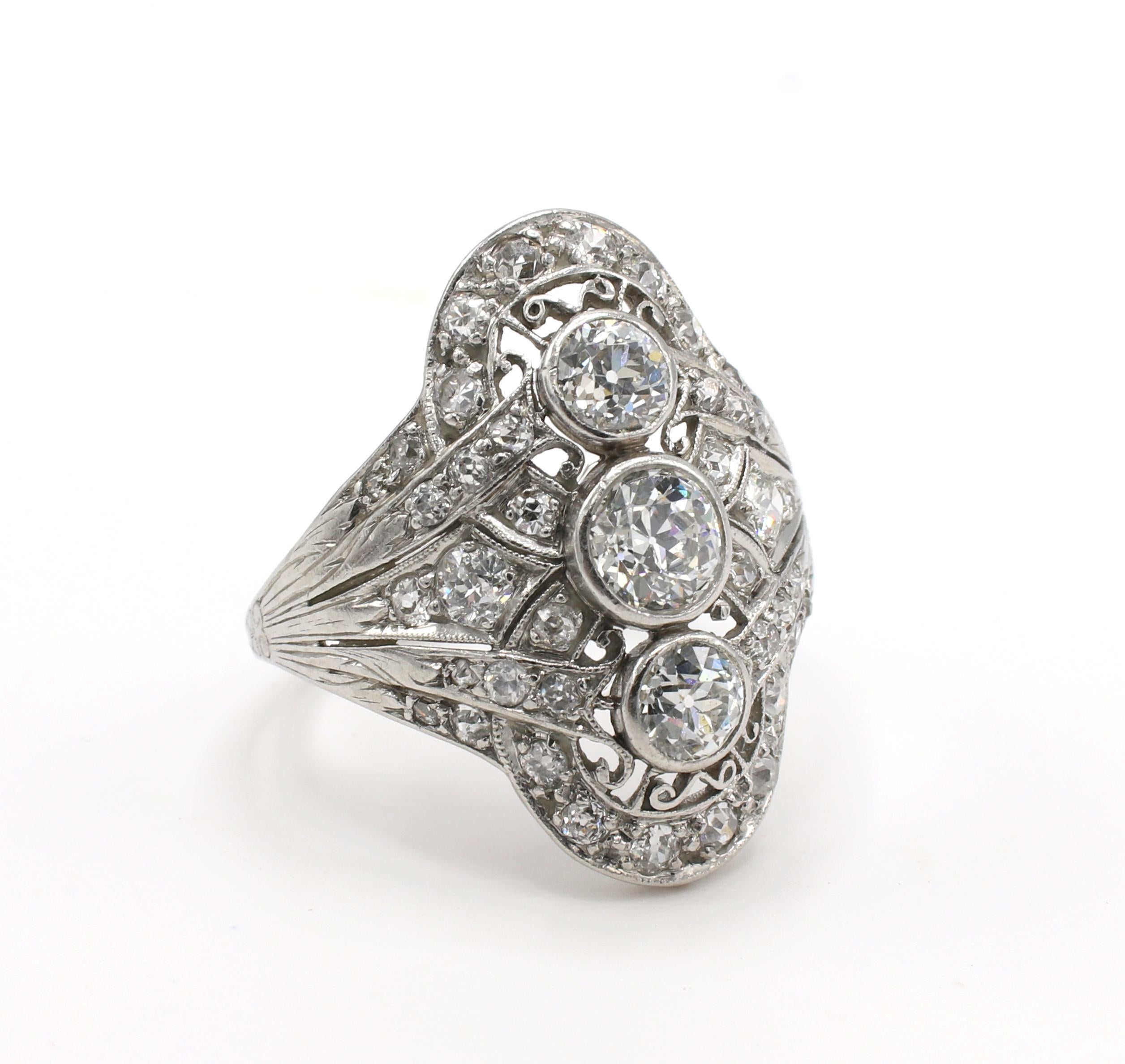 Antique Platinum Old European Cut Diamond Navette Cocktail Ring 
Metal: Platinum
Weight: 5.03 grams
Diamonds: Approx. 1.50 CTW G-H VS old European cut diamonds
Top: 23 x 18mm
Size: 6 (US)
