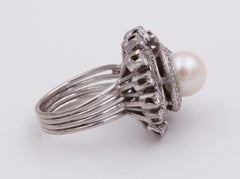 Antique Platinum, Pearl and Round Cut Diamond Ring, 1940s