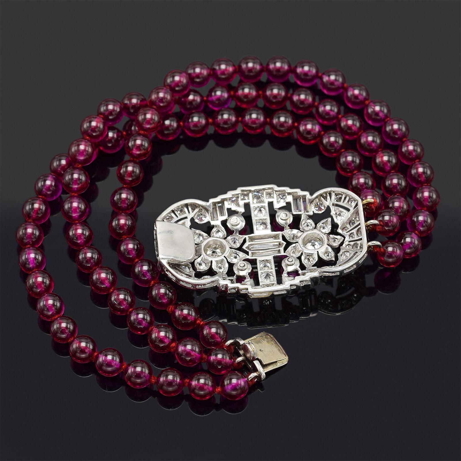 Weight: 32.6 Grams
Stone: Ruby (3.5-5.2 mm) & Approx 3.85 TCW (0.01-0.18 ct) H/I VS Old Euro & Baguette Diamonds
Clasp Measurements: 38.5 x 23.4 mm
Bracelet Size: 7 Inches
Hallmark: Platinum Tested

ITEM #: BR-519-082021-05
