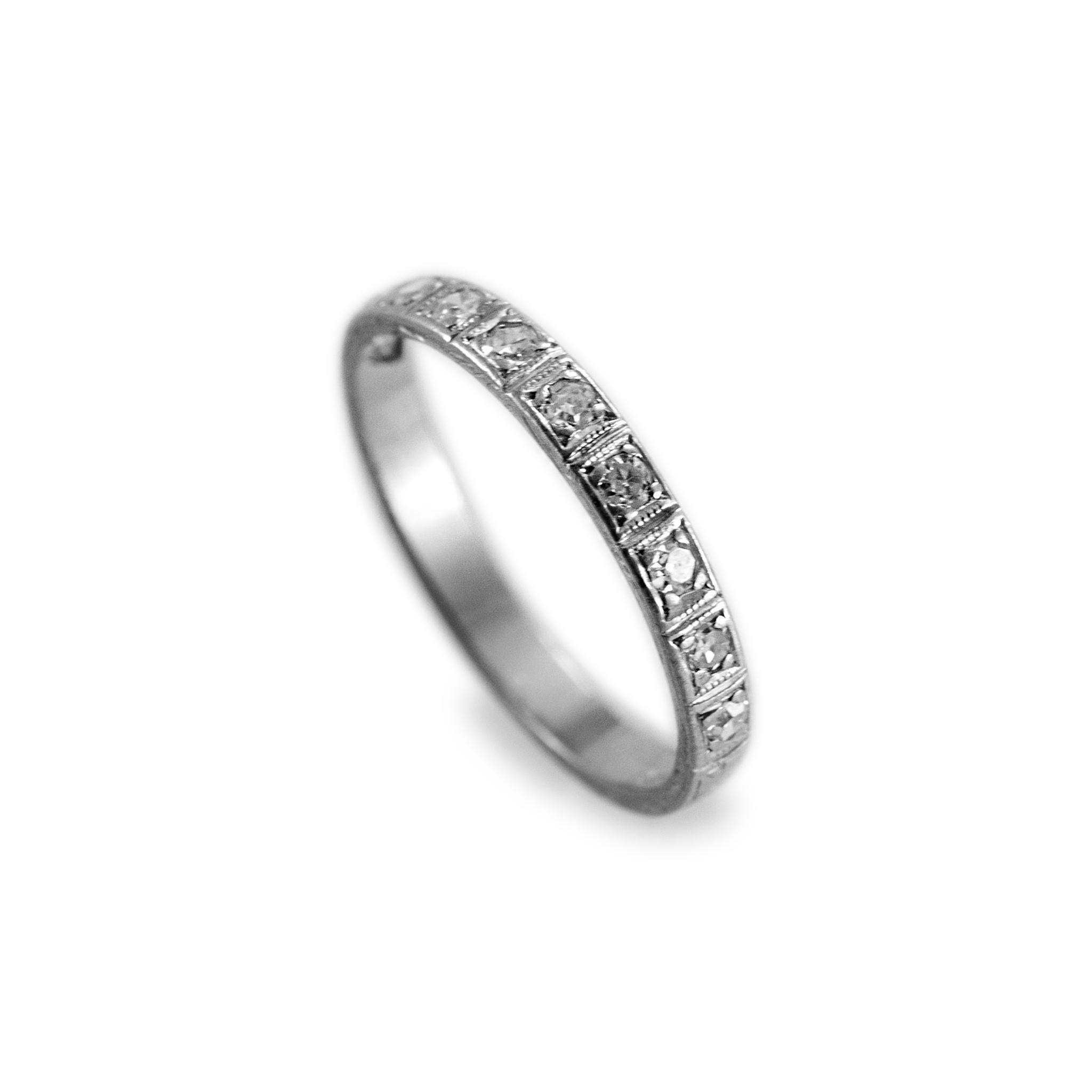 Gender: Ladies

Metal Type: Platinum

Ring Size: 6 

Width: 2.50 mm

Weight: 2.13 grams

One ladies platinum diamond antique wedding band with a soft-square shank. The metal was tested and determined to be platinum. Engraved with 
