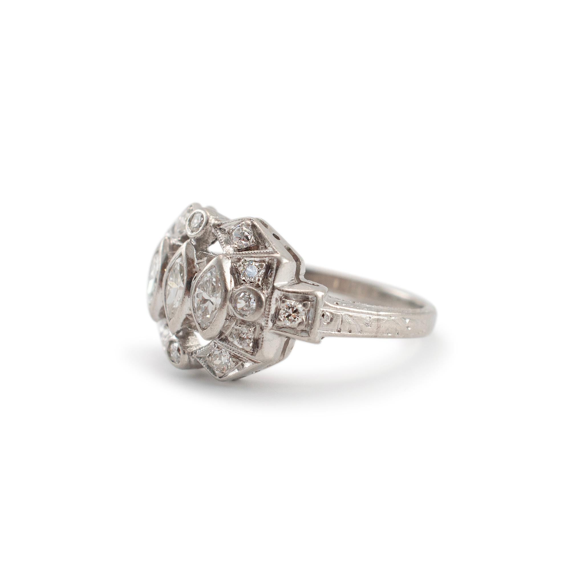 Gender: Ladies

Metal Type: Platinum

Ring Size: 4

Width: 10.40 mm

Weight: 3.47 grams

Ladies Platinum diamond antique three-stone, cocktail ring with a half round shank. The metal was tested and determined to be platinum. Engraved with 
