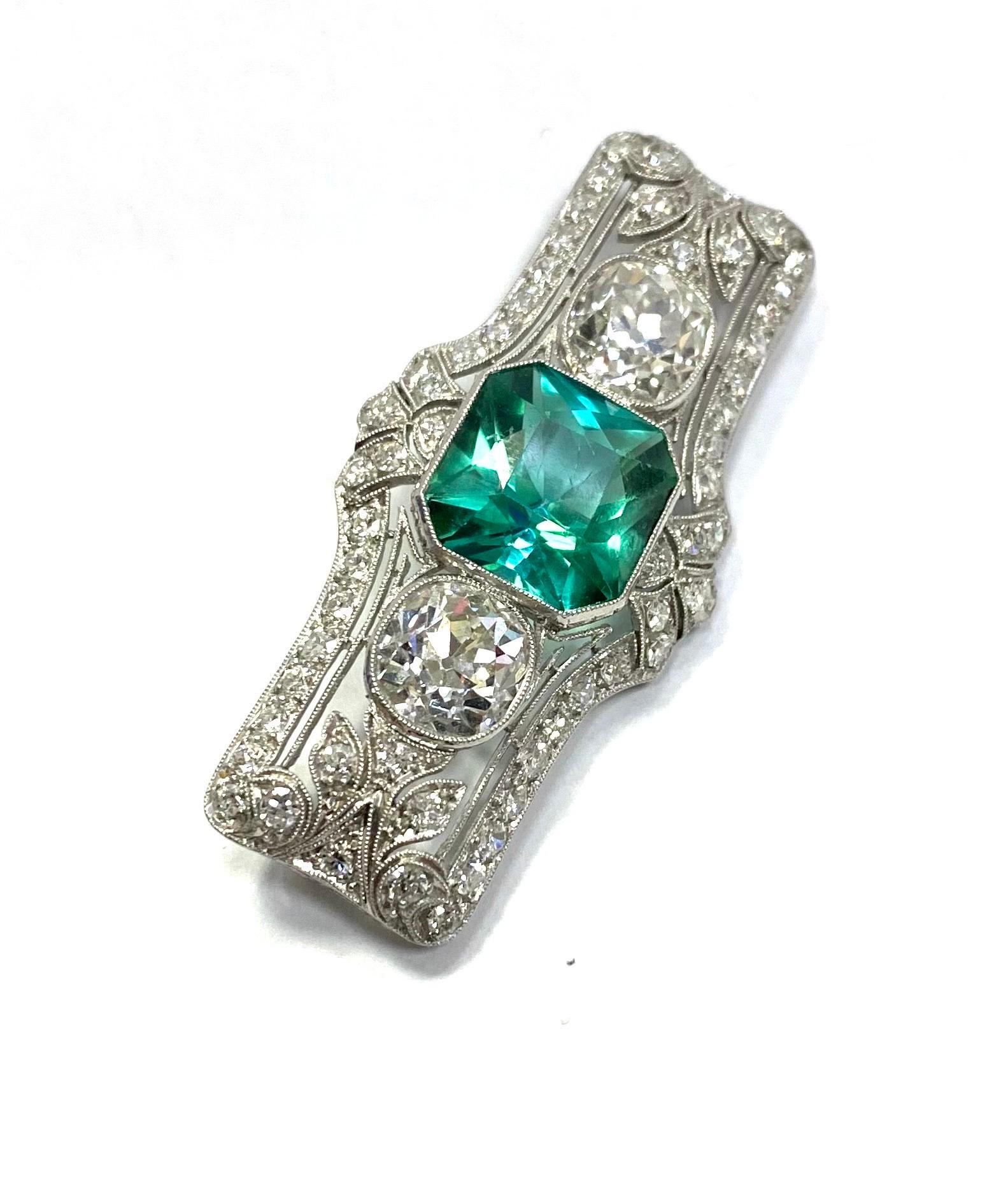 Antique Platinum Tourmaline and Вiamonds Brooch
Period: Circa 1920-1930
Big certified green tourmaline
Two big diamonds: Over 2cts each
Small Diamonds: 1.6ctw
F-G color, VVS
