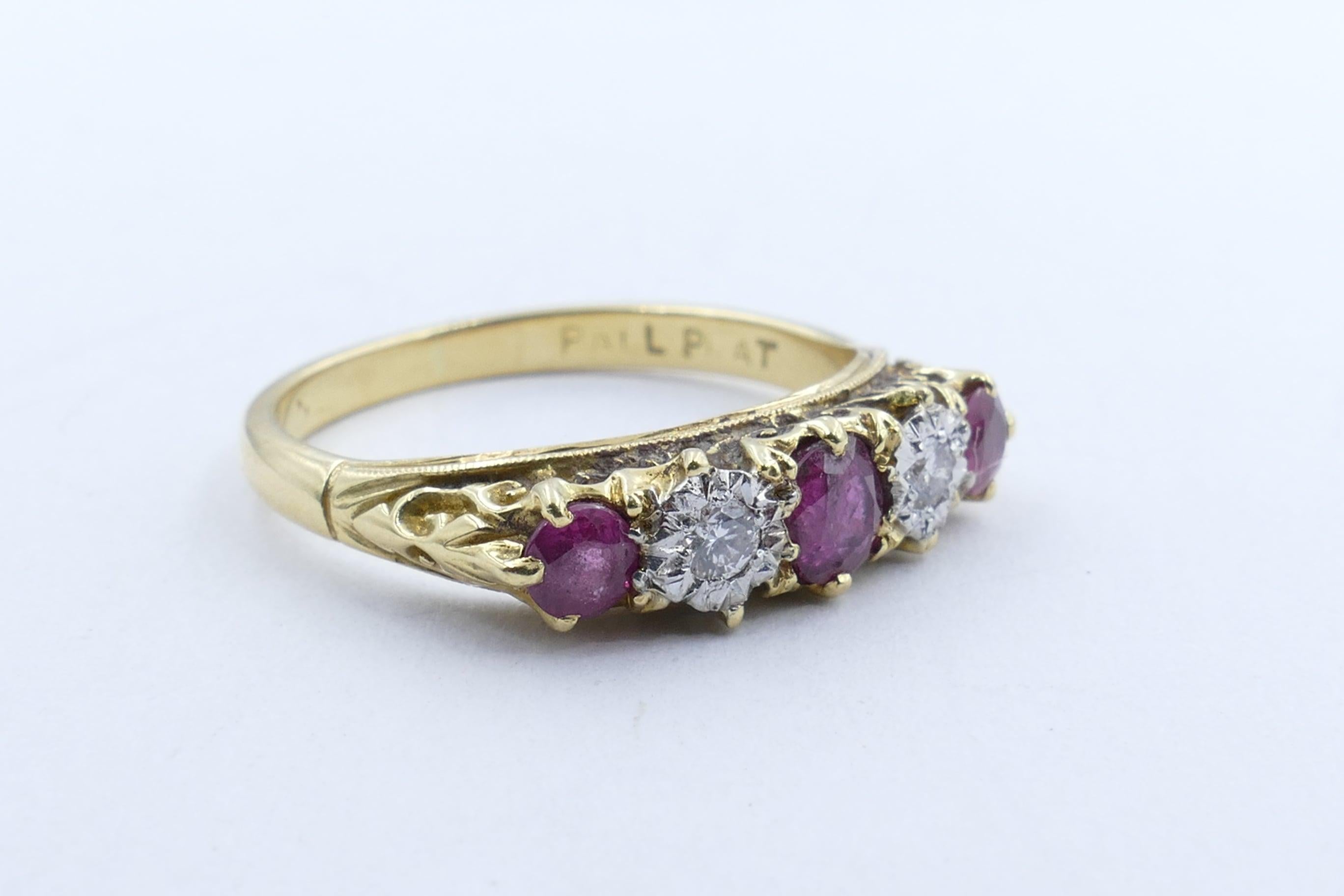This is SUCH a beautiful old Ring. And in excellent condition. 
It would serve as an Engagement Ring or simply a very attractive Eternity or Dress Ring The centre Ruby in this is 0.35 carats & is flanked by a further 2 rubies weighing 0.37 carats.