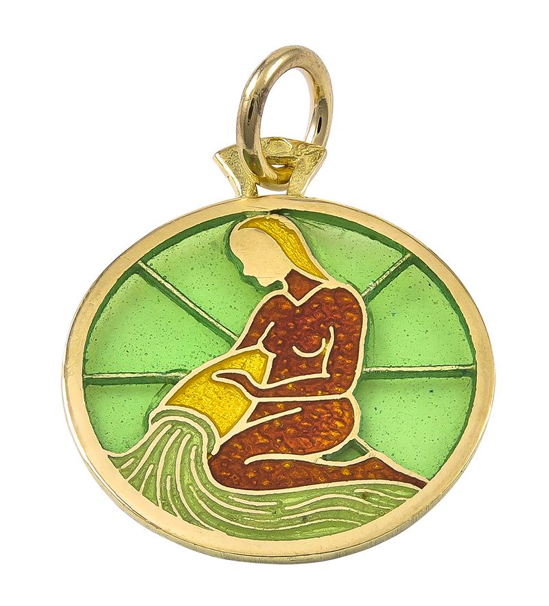 Outstanding charm:  Aquarius in 18K yellow gold and plique a jour.  A lovely representation of a woman pouring water.  2/3