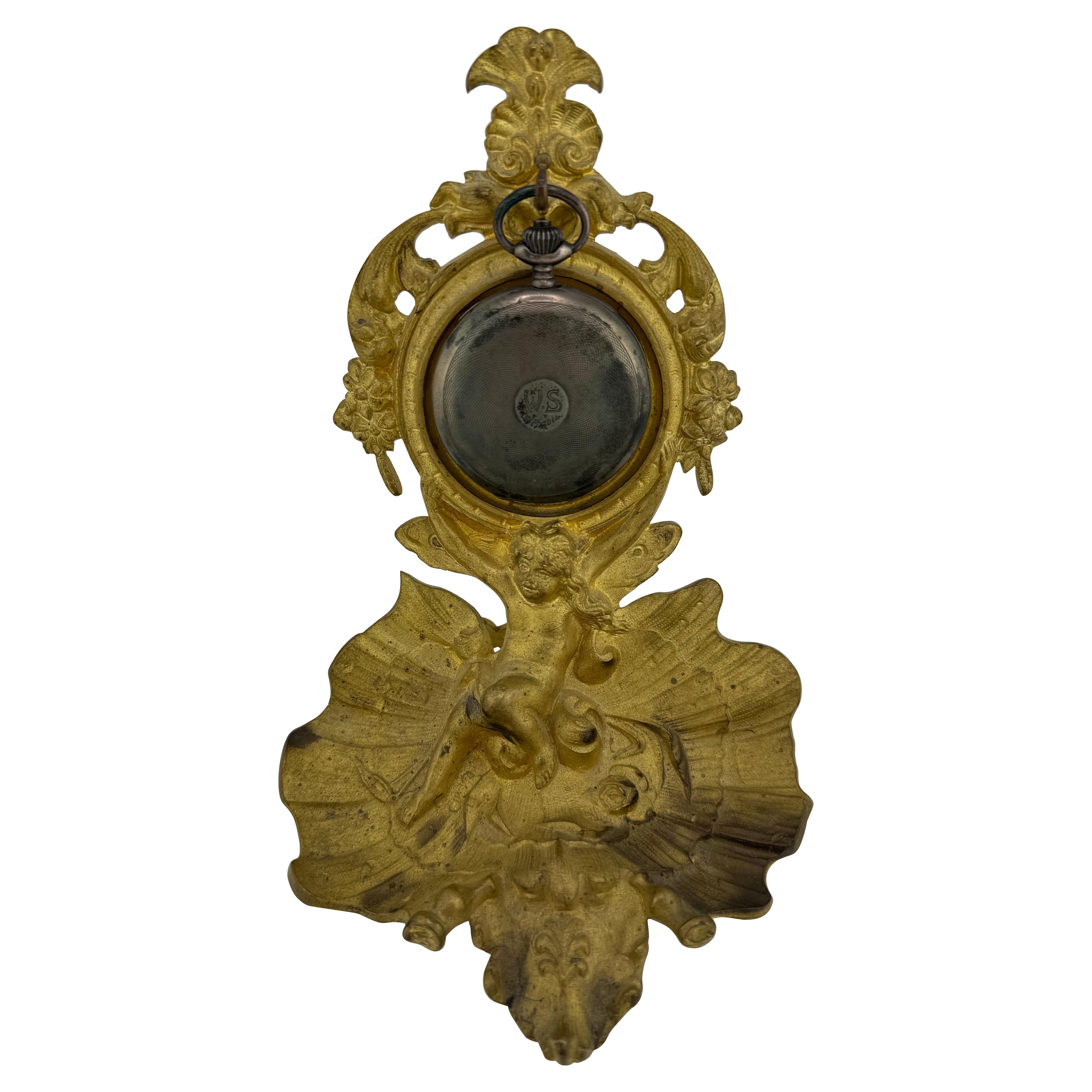 Antique pocket watch holder applies 19th century putto on oyster For Sale