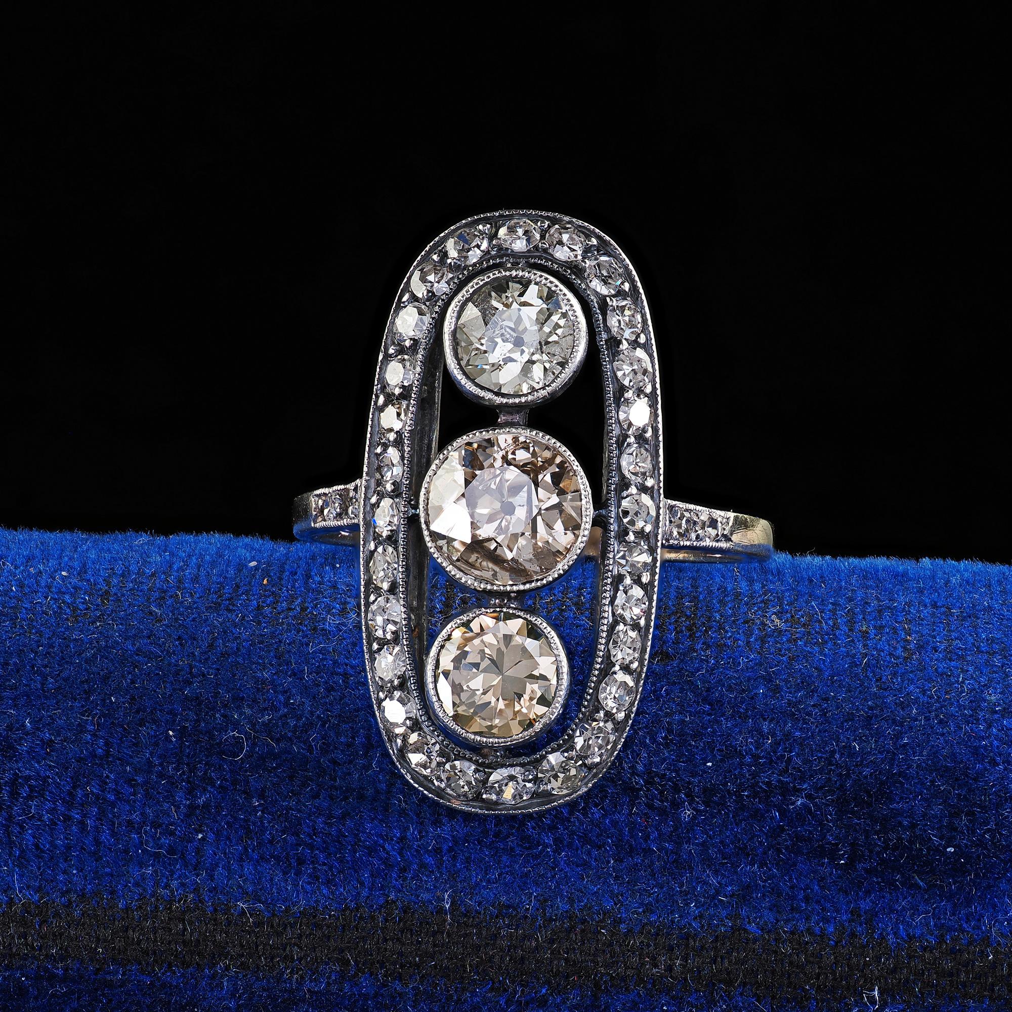 Beautiful Antique Polish Art Deco 14K Gold Silver Old European Diamond Three Stone Ring. This incredible Polish Art Deco old European cut diamond three stone ring is crafted in 14k yellow gold and silver. This ring features three larger old European