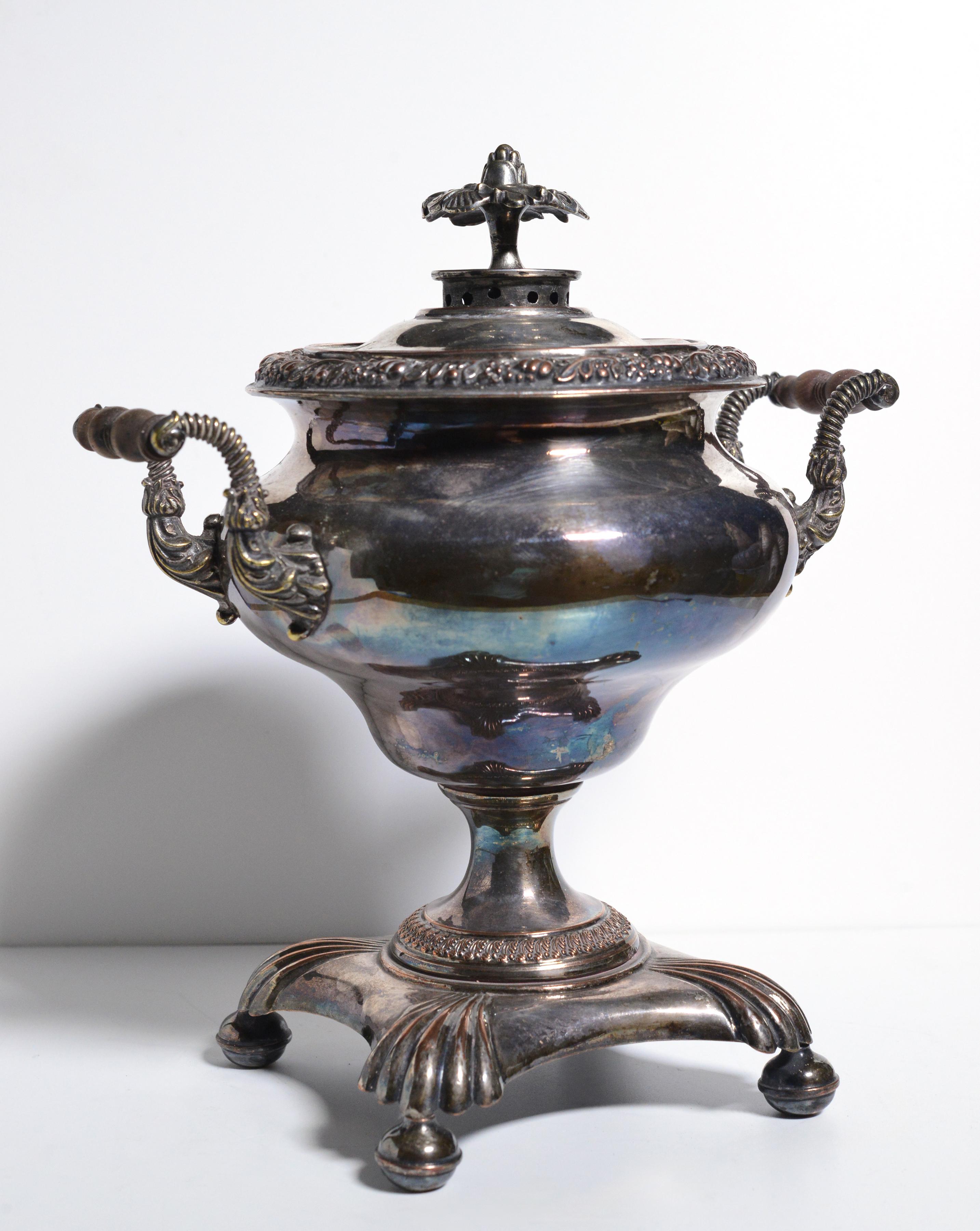 Copper body tea urn decorated with hand chased brass cast and silver plating. This is pretty rare fire operated samovar of beautiful artisan performance. This samovar can also be used for its intended purpose, medium size for few persons with
