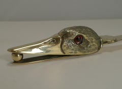 Antique Polished Brass Novelty Letter Opener, Duck With Glass Eyes, circa 1900