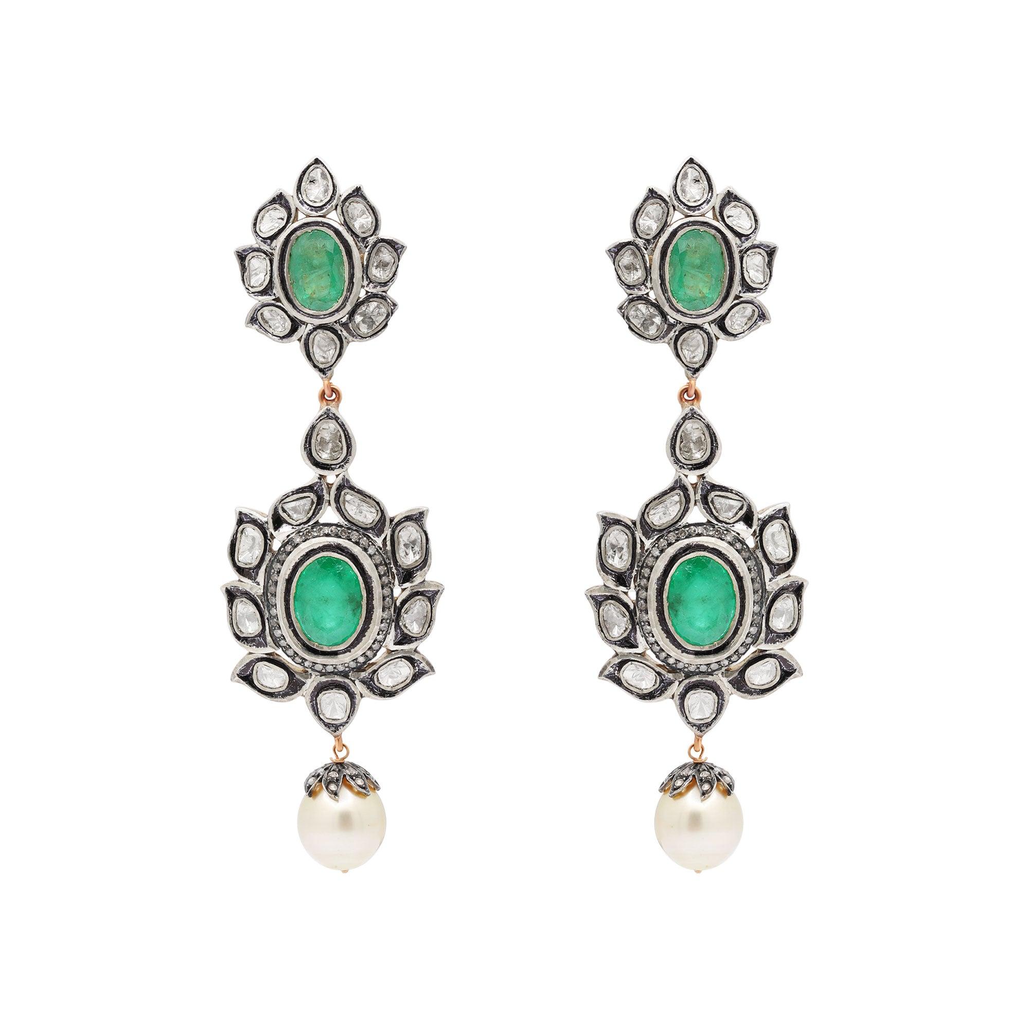Antique Victorian Polki Diamond Earrings  with Emerald and pearl Natural Diamond polki 

Price listed for pair  of Earrings 
  Approx 30gram 
Gemstone: Diamond
Closure: Push back


A P P R O X T I M E

All items are custom made to order. Our approx